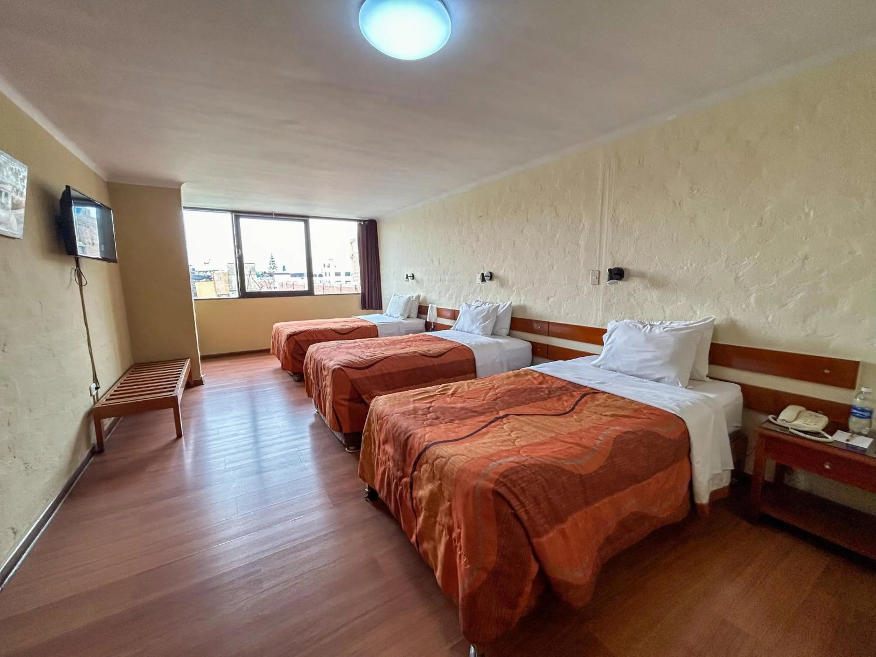 Photo of the whole room, Bed in Holiday Suites