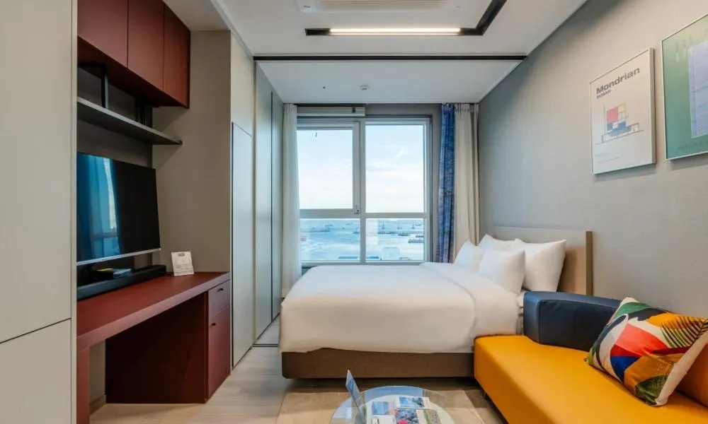 Bed in Radiant Nampo Hotel