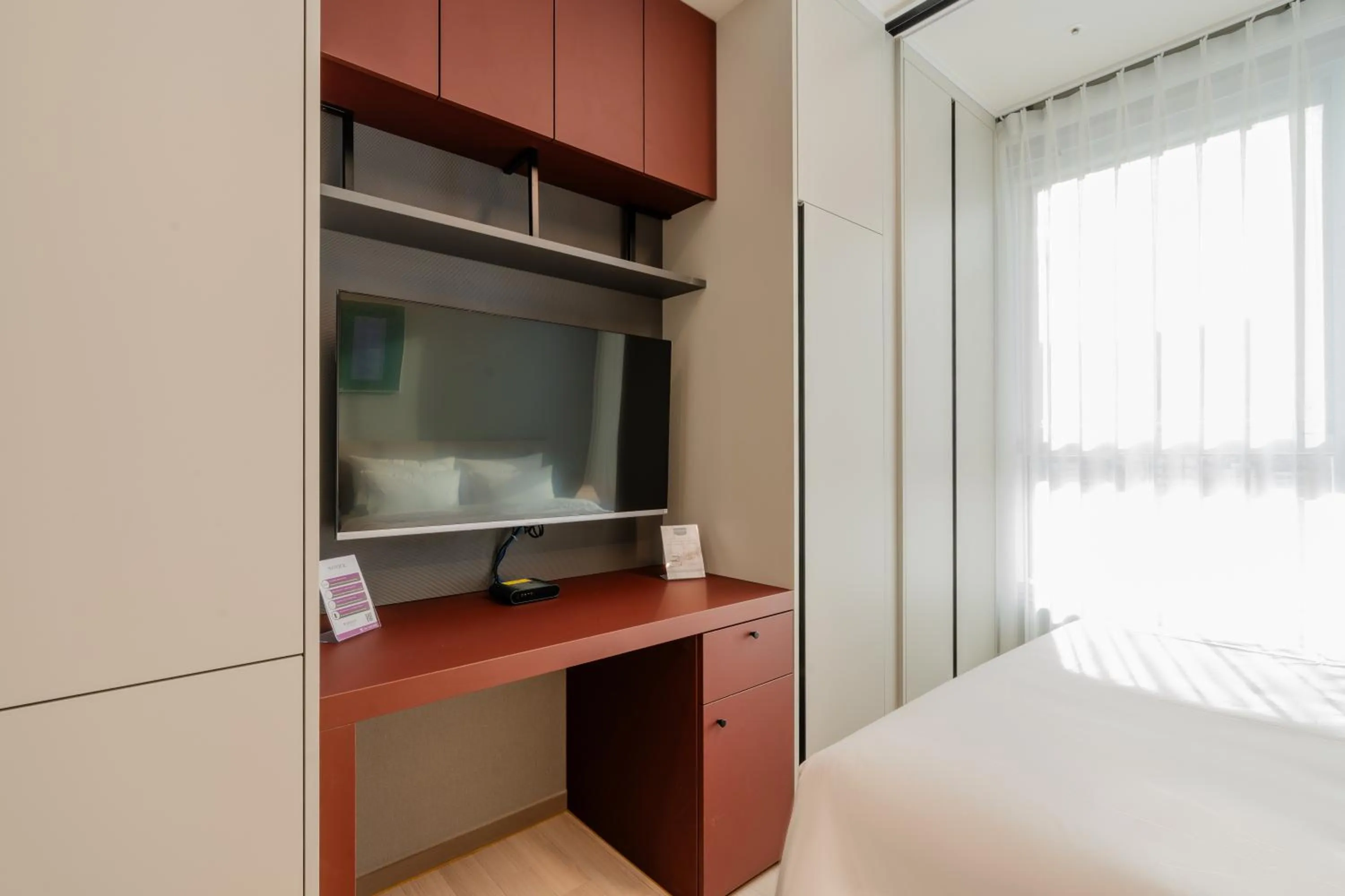 TV and multimedia, Bed in Radiant Nampo Hotel