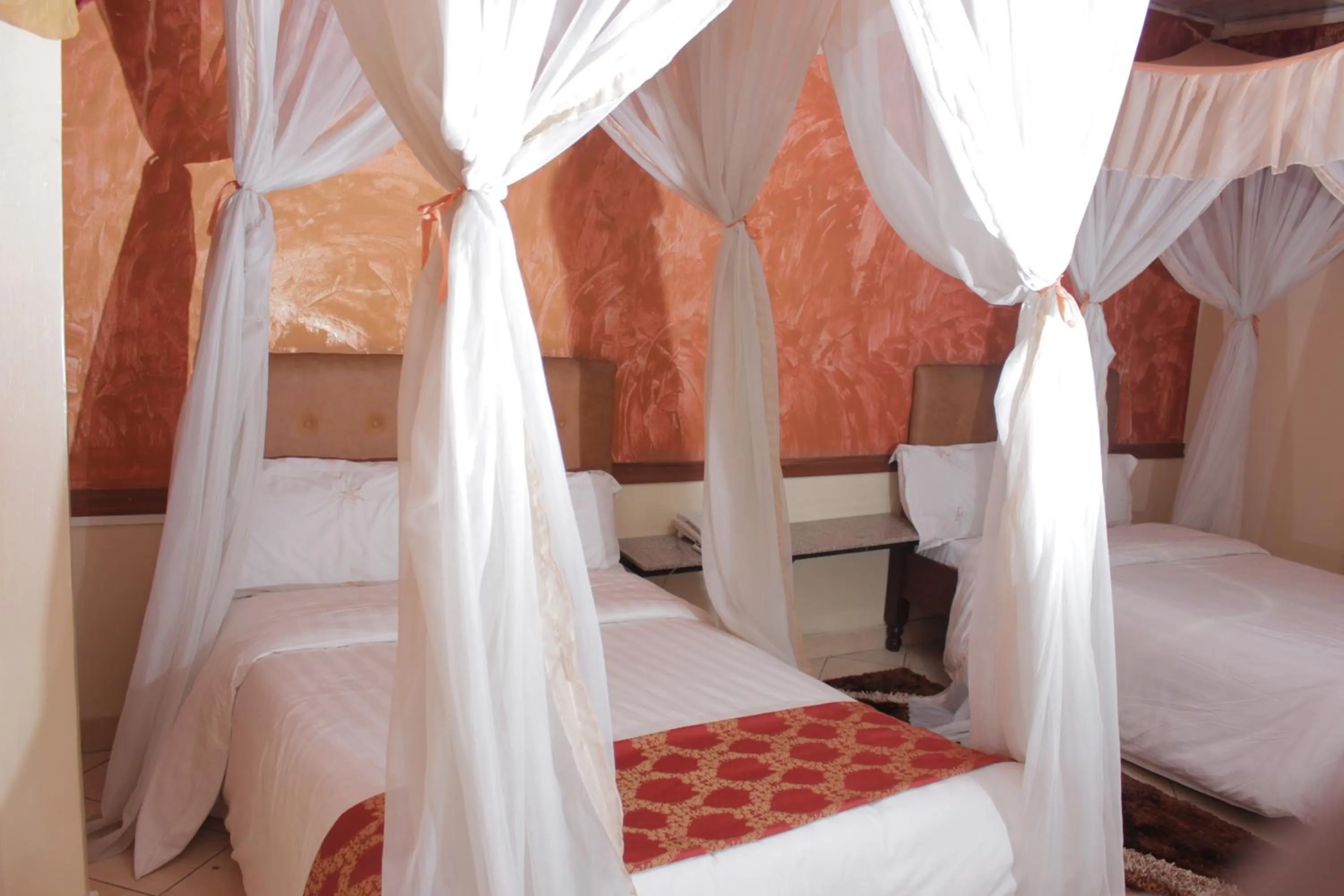 Bedroom in Pearl Palace Hotel