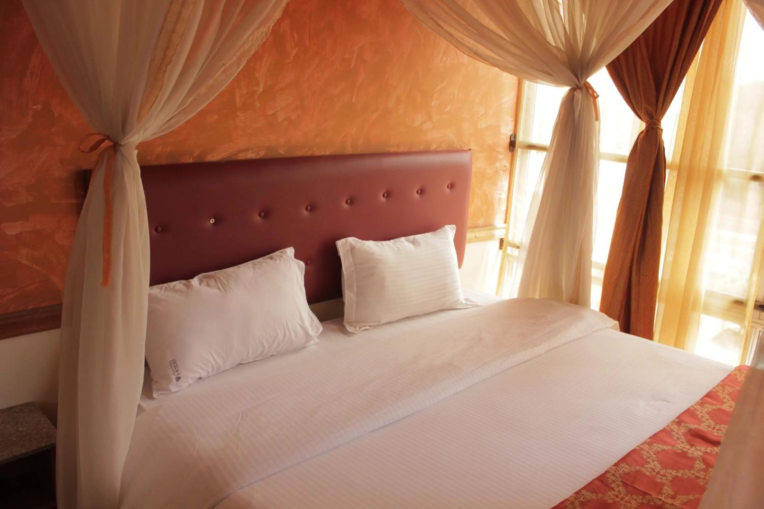 Bedroom in Pearl Palace Hotel