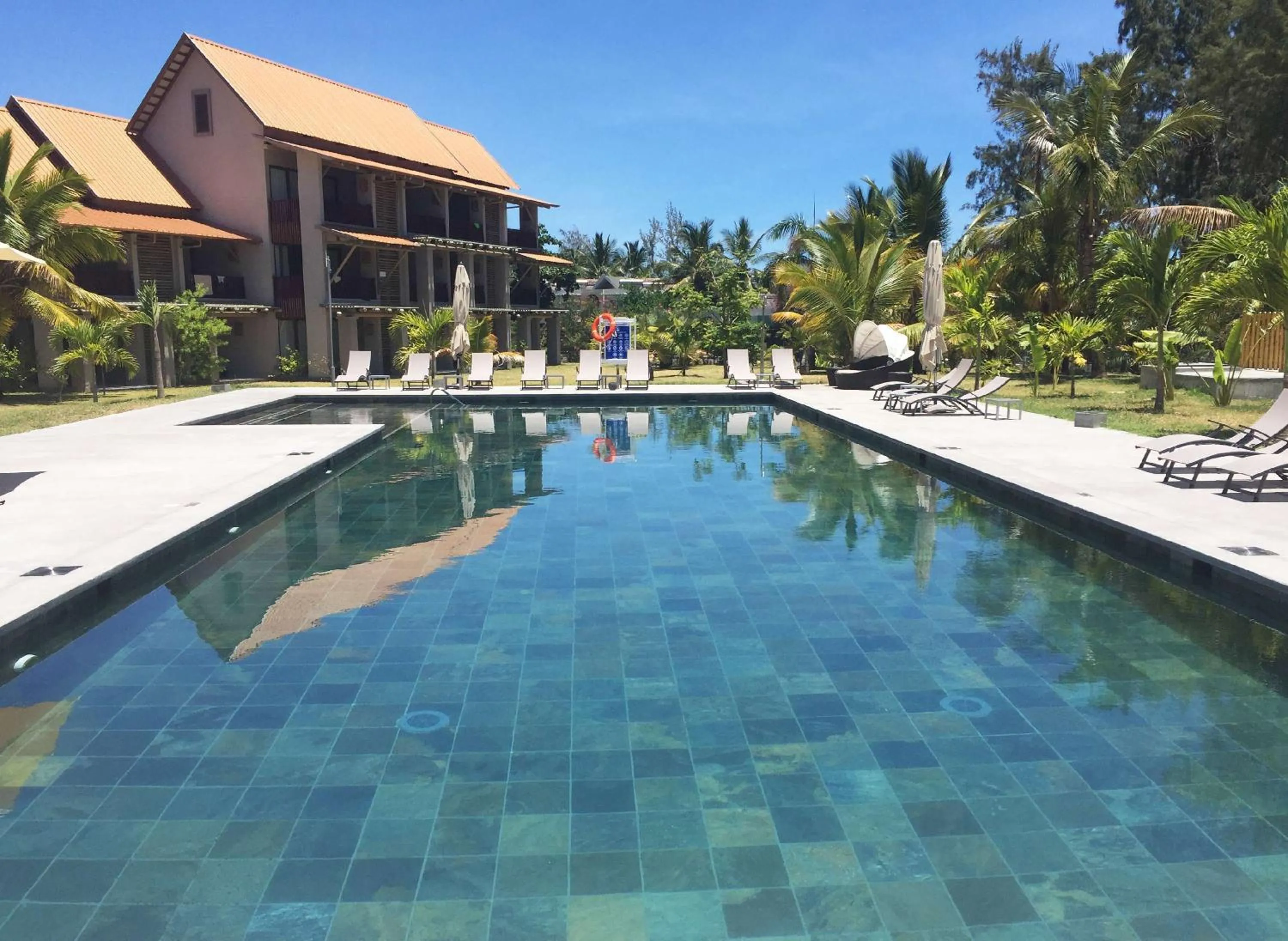 Swimming pool in Crystals Beach Resort Belle Mare, a member of Radisson Individuals