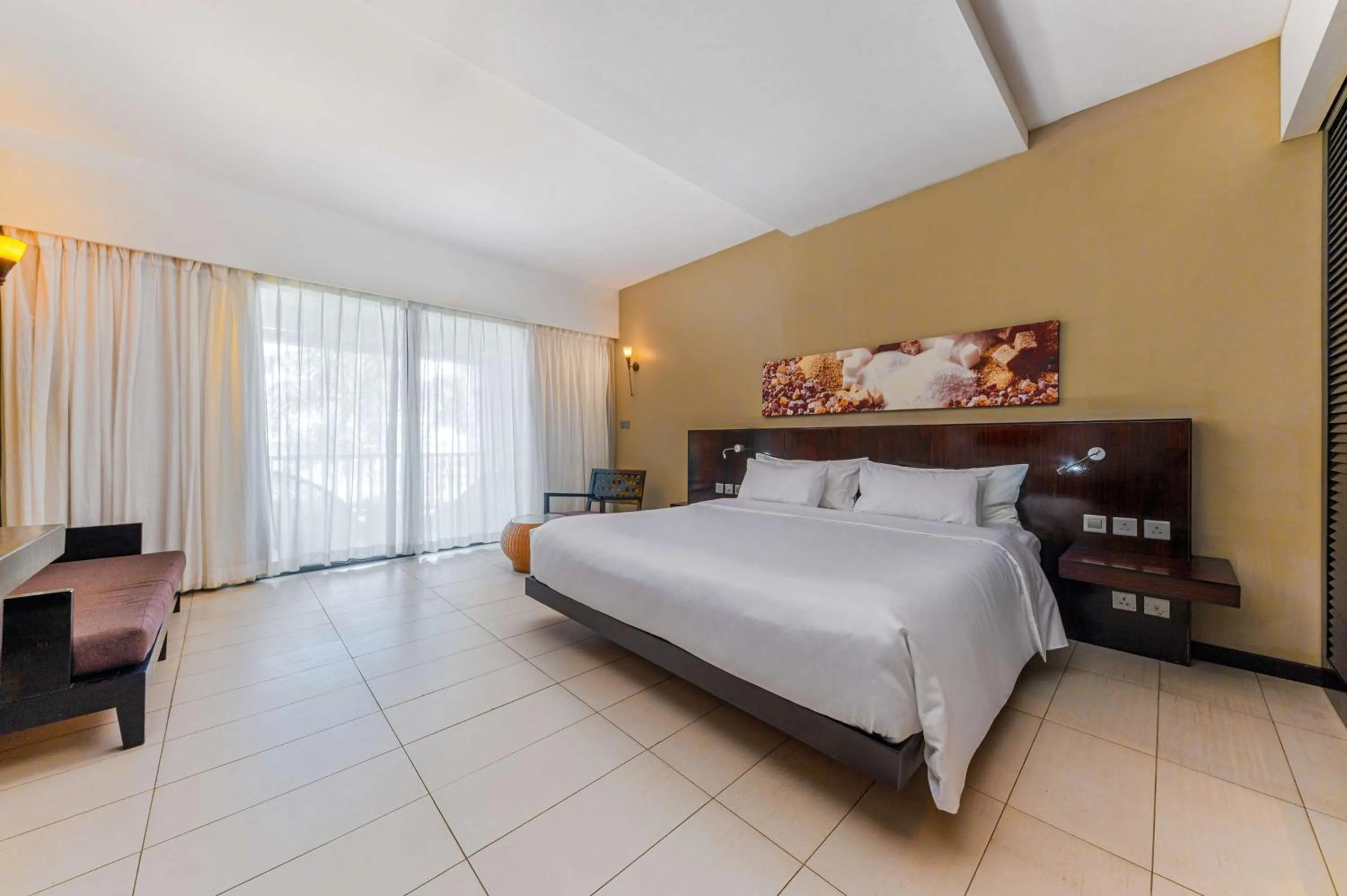 Bedroom, Bed in Crystals Beach Resort Belle Mare, a member of Radisson Individuals