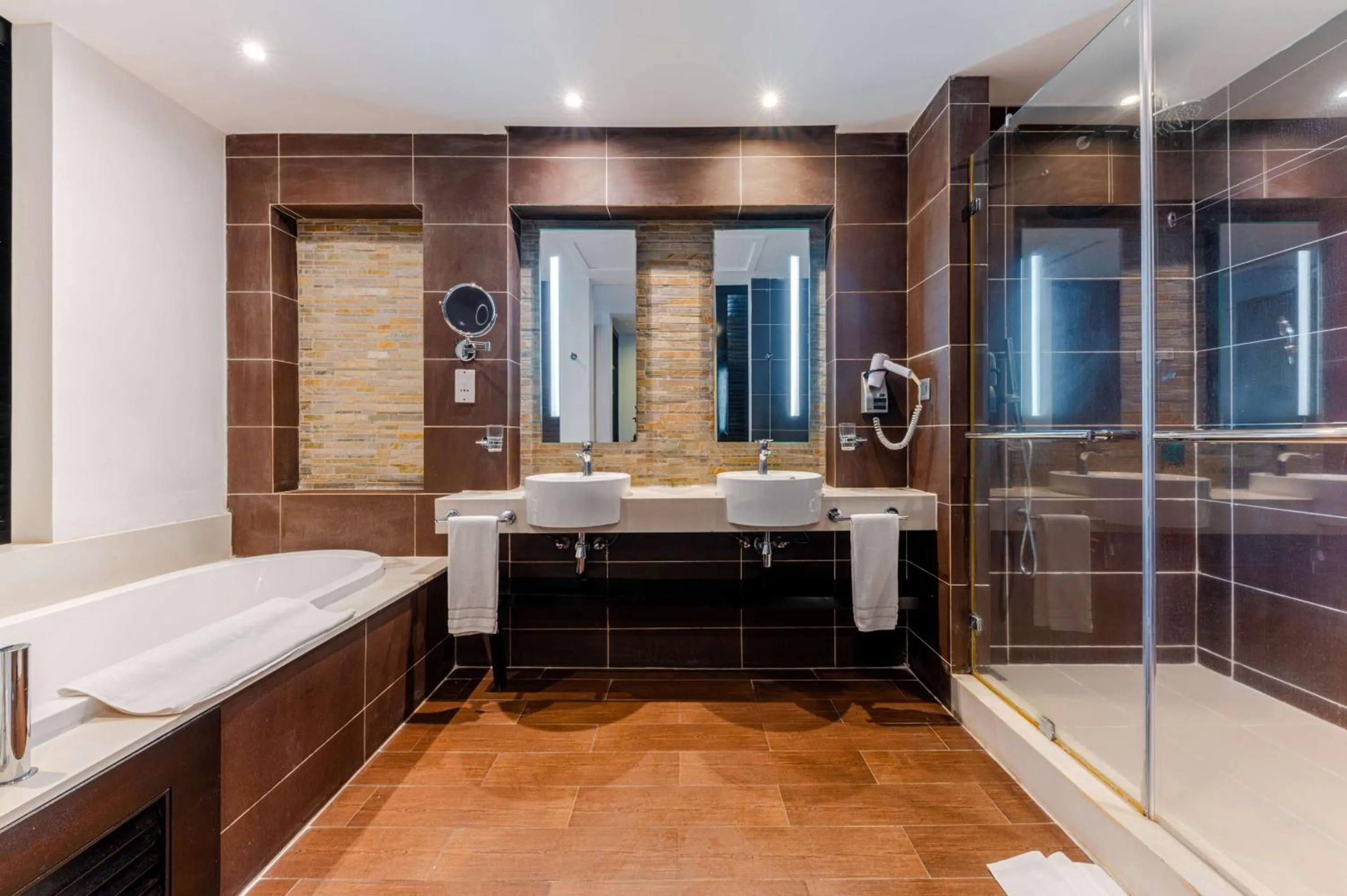 Bathroom in Crystals Beach Resort Belle Mare, a member of Radisson Individuals