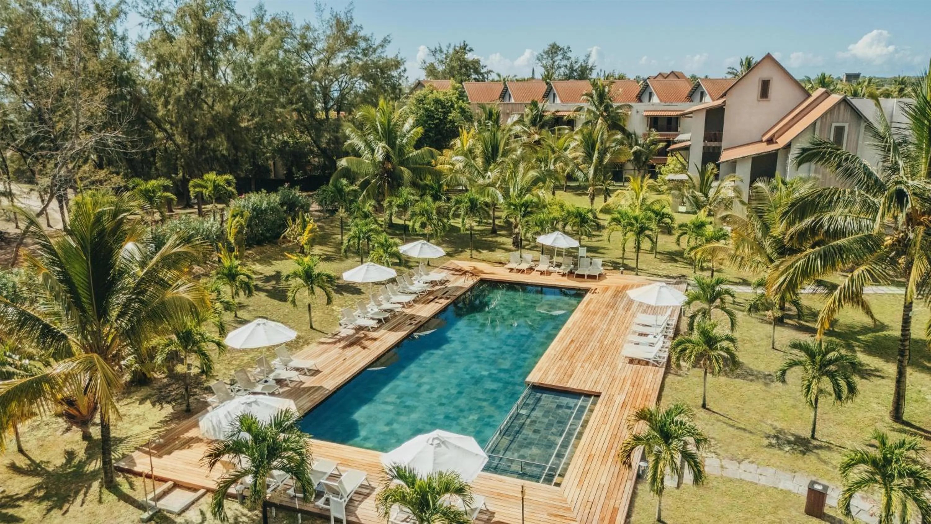 Pool view in Crystals Beach Resort Belle Mare, a member of Radisson Individuals