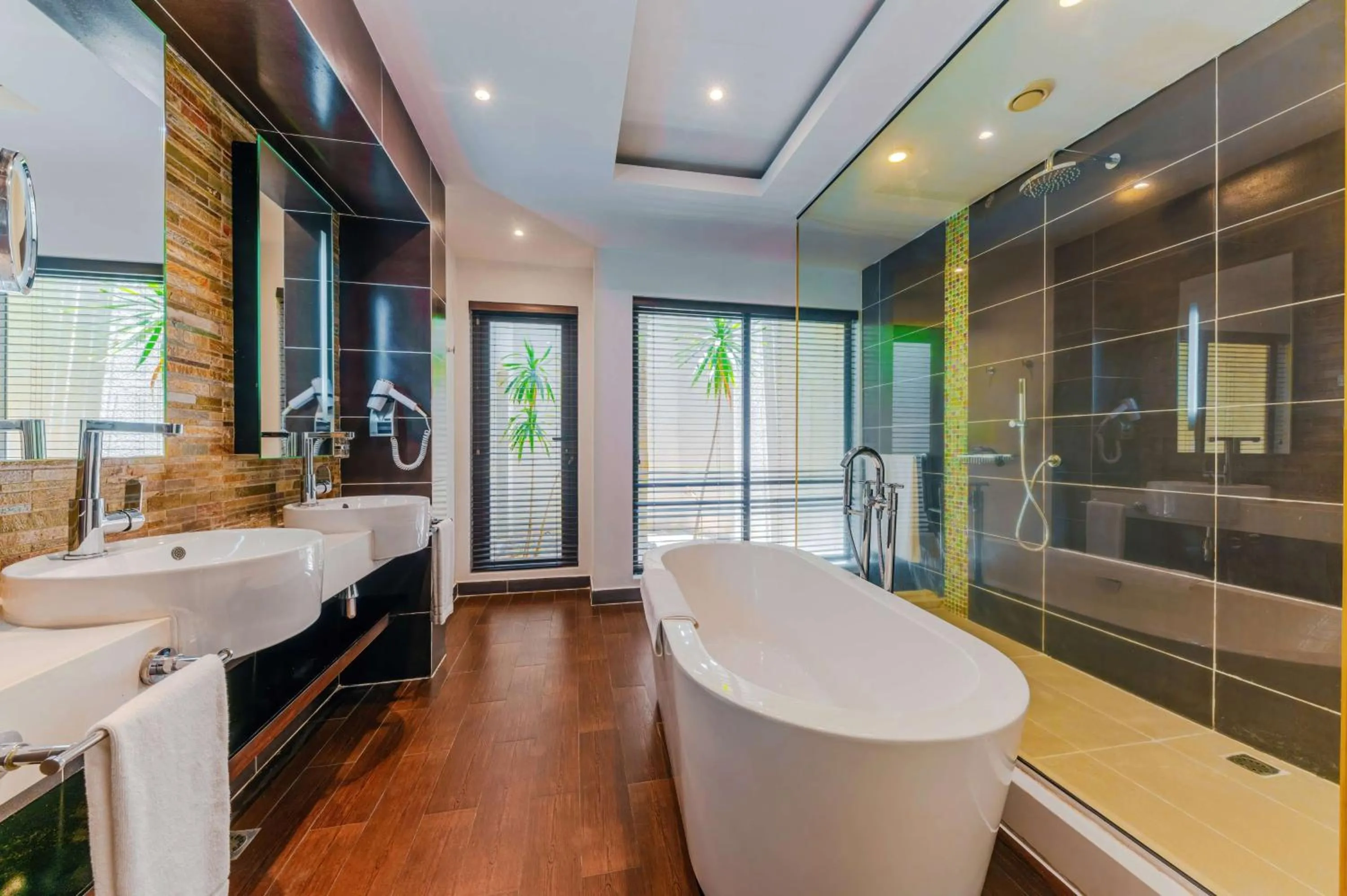 Bathroom in Crystals Beach Resort Belle Mare, a member of Radisson Individuals