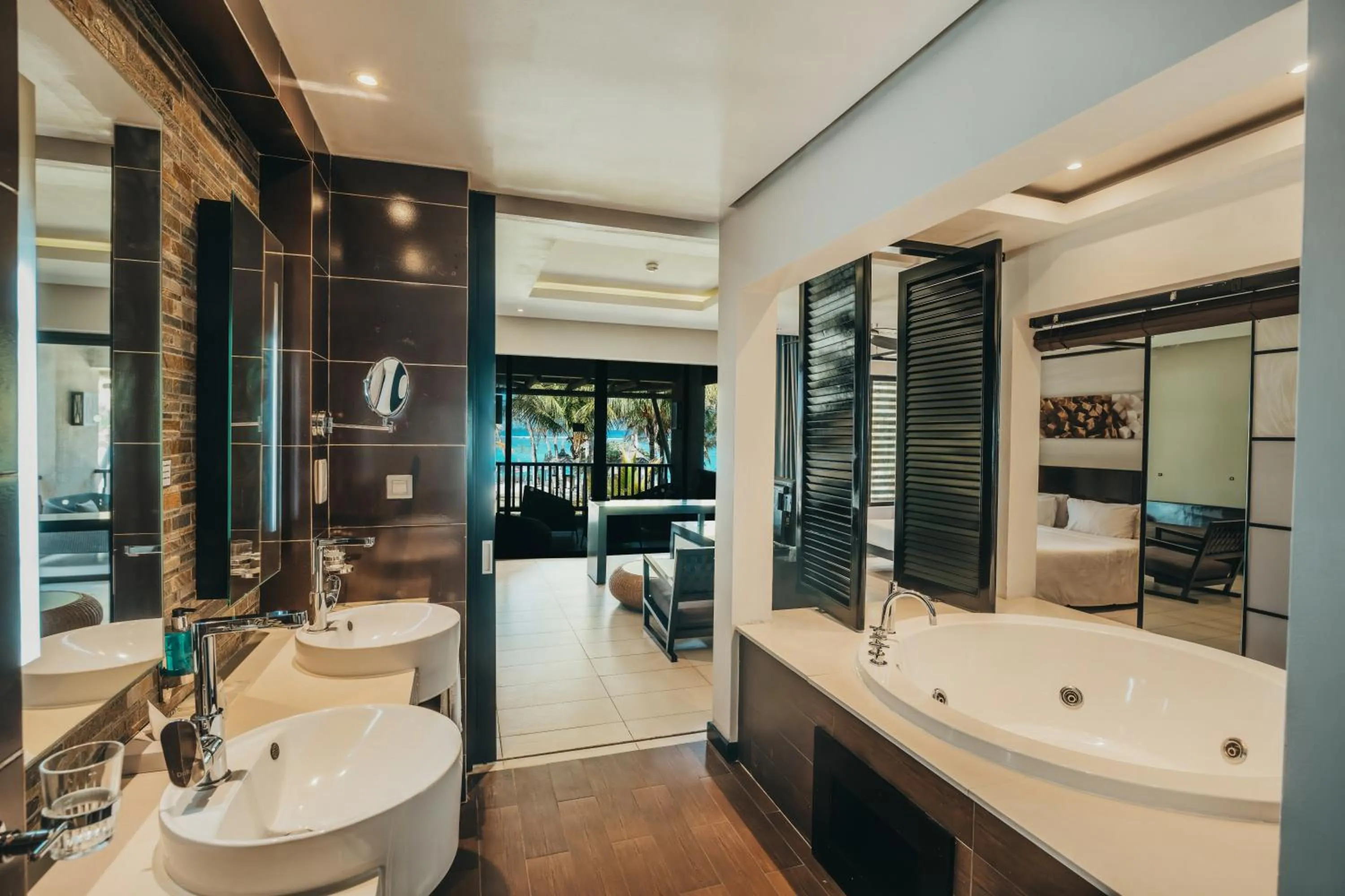 Bathroom in Crystals Beach Resort Belle Mare, a member of Radisson Individuals