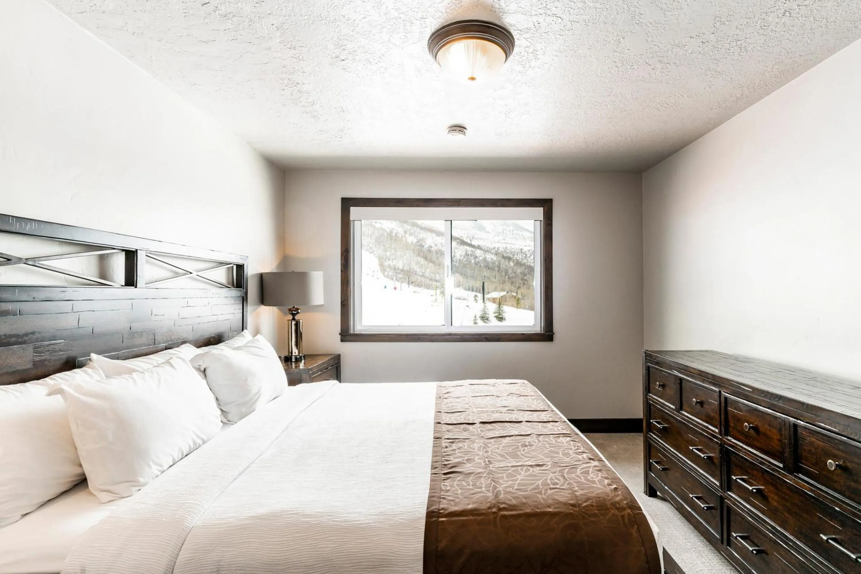 Bed in The Loft at Mountain Village by All Seasons Resort Lodging