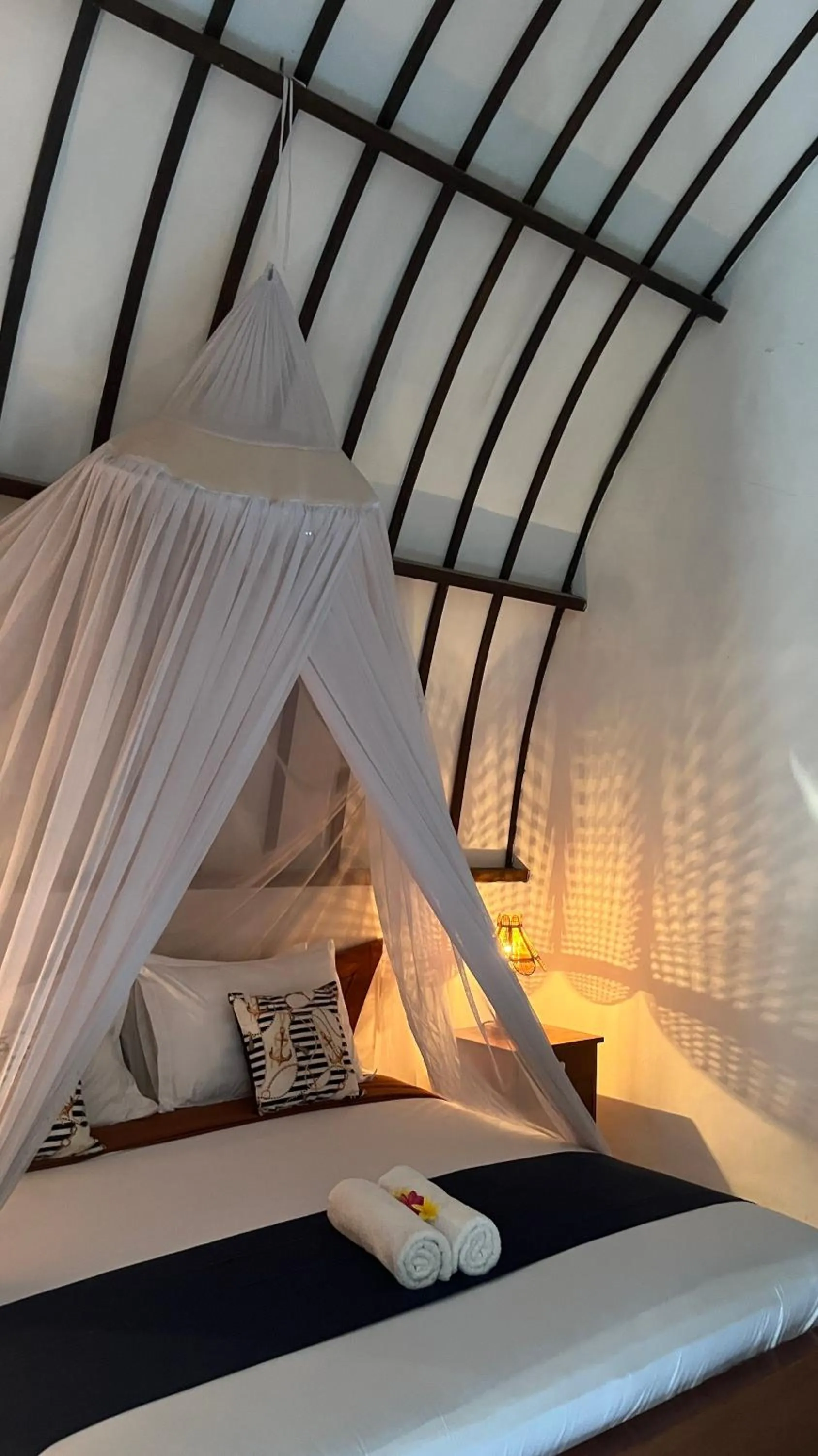 Bed in Mustika Ocean Lodge