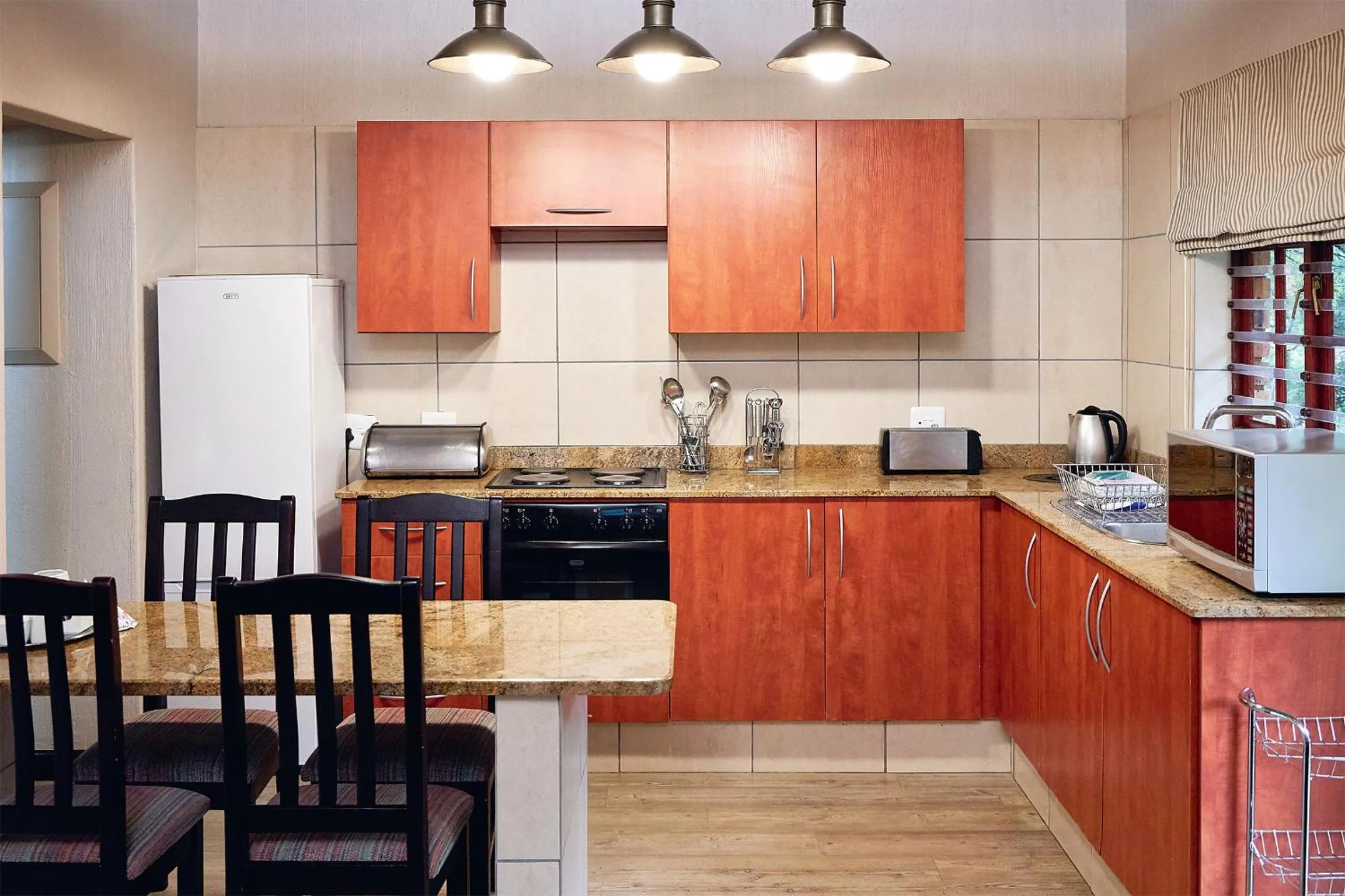 Kitchen or kitchenette in First Group Magalies Park