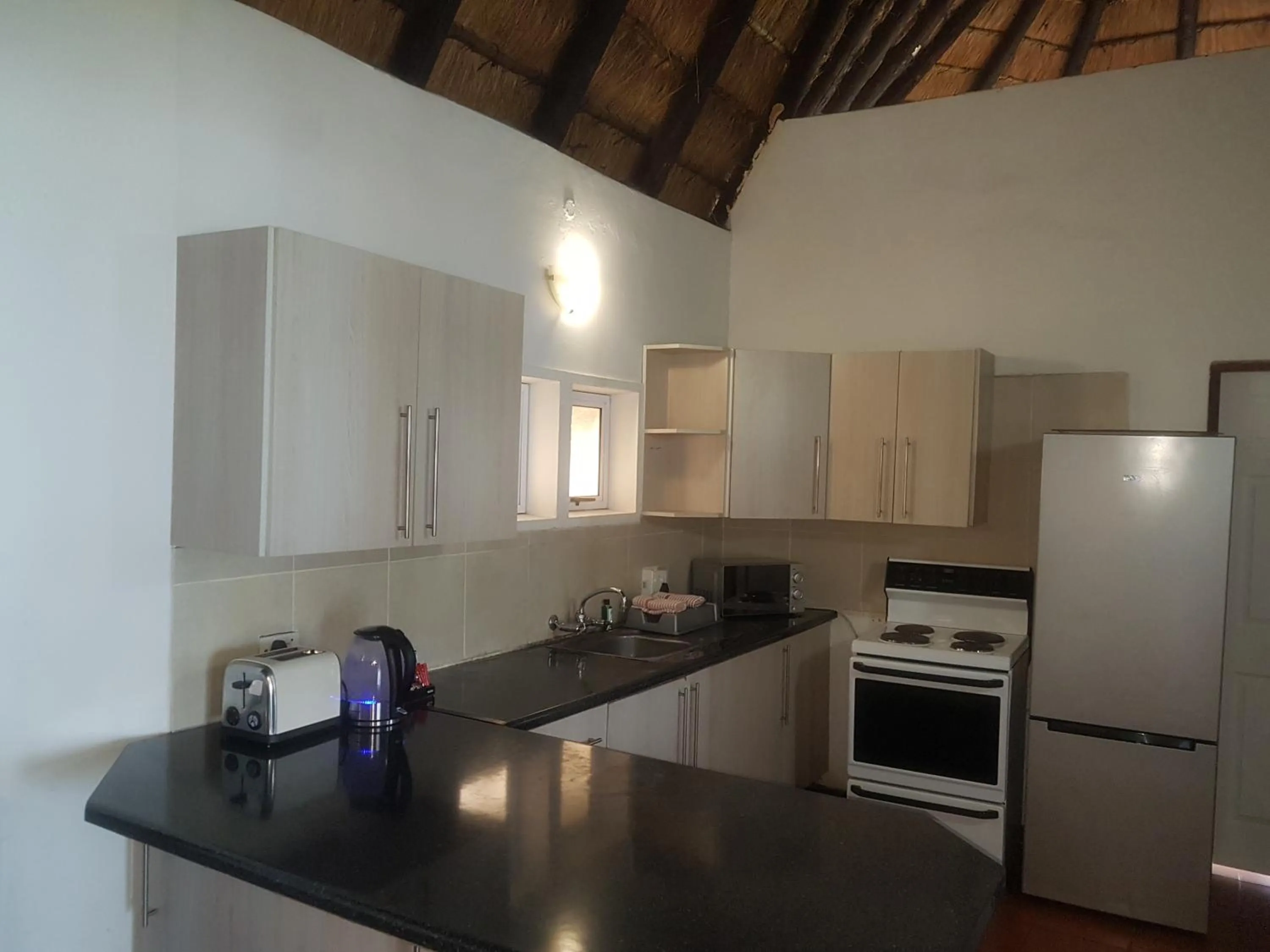 Kitchen or kitchenette in First Group Hole in the Wall