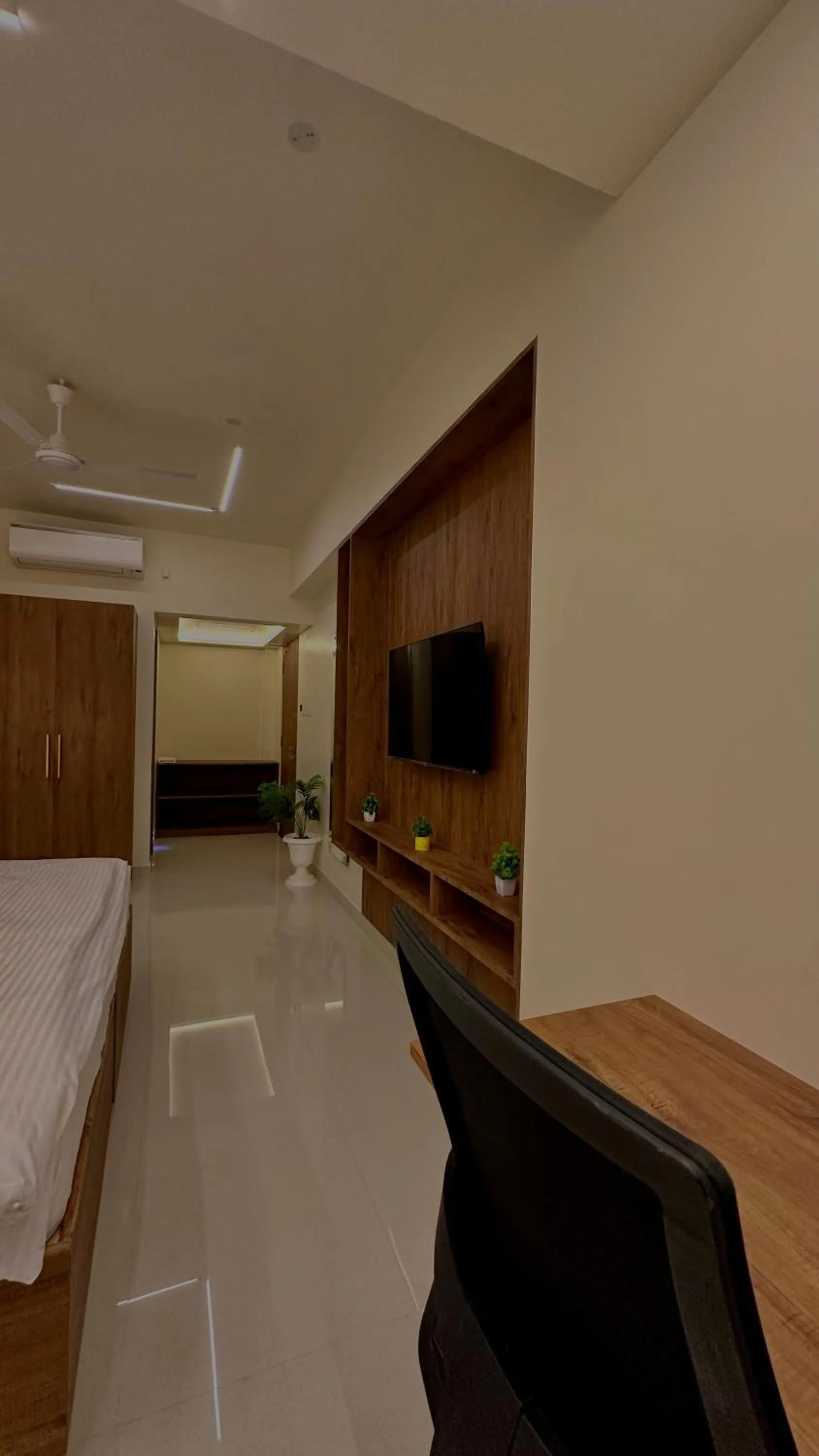 Bed in DrizzleDrop Inn Chennai