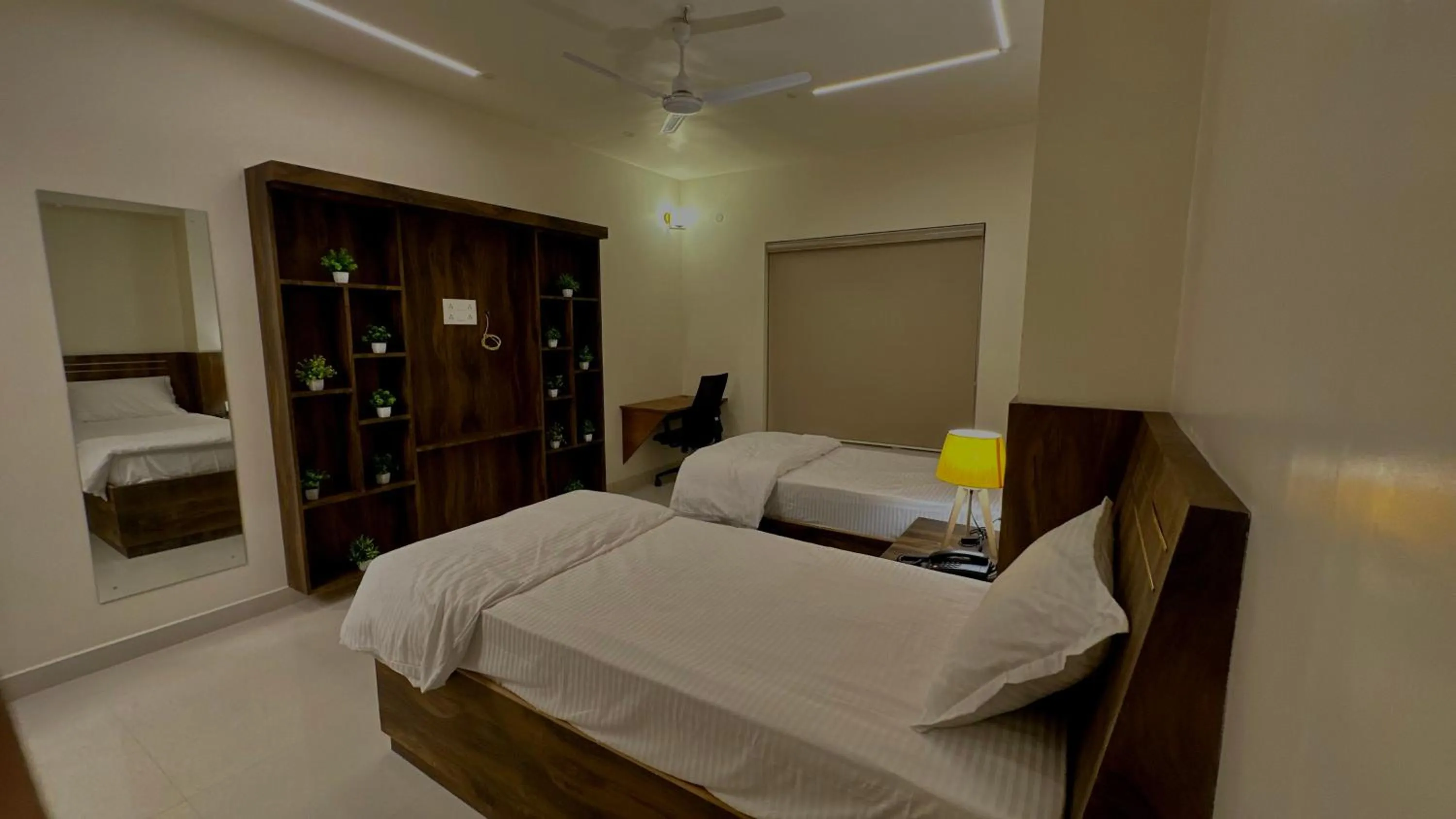 Bed in DrizzleDrop Inn Chennai