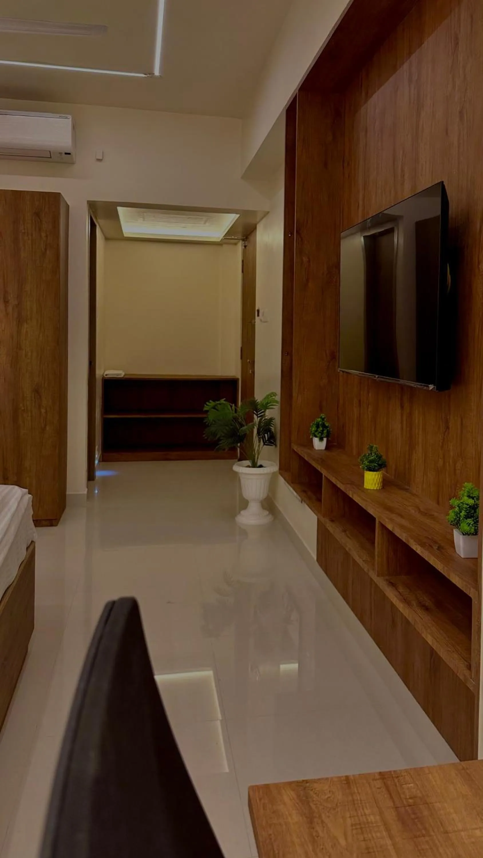 Communal lounge/ TV room, Bed in DrizzleDrop Inn Chennai