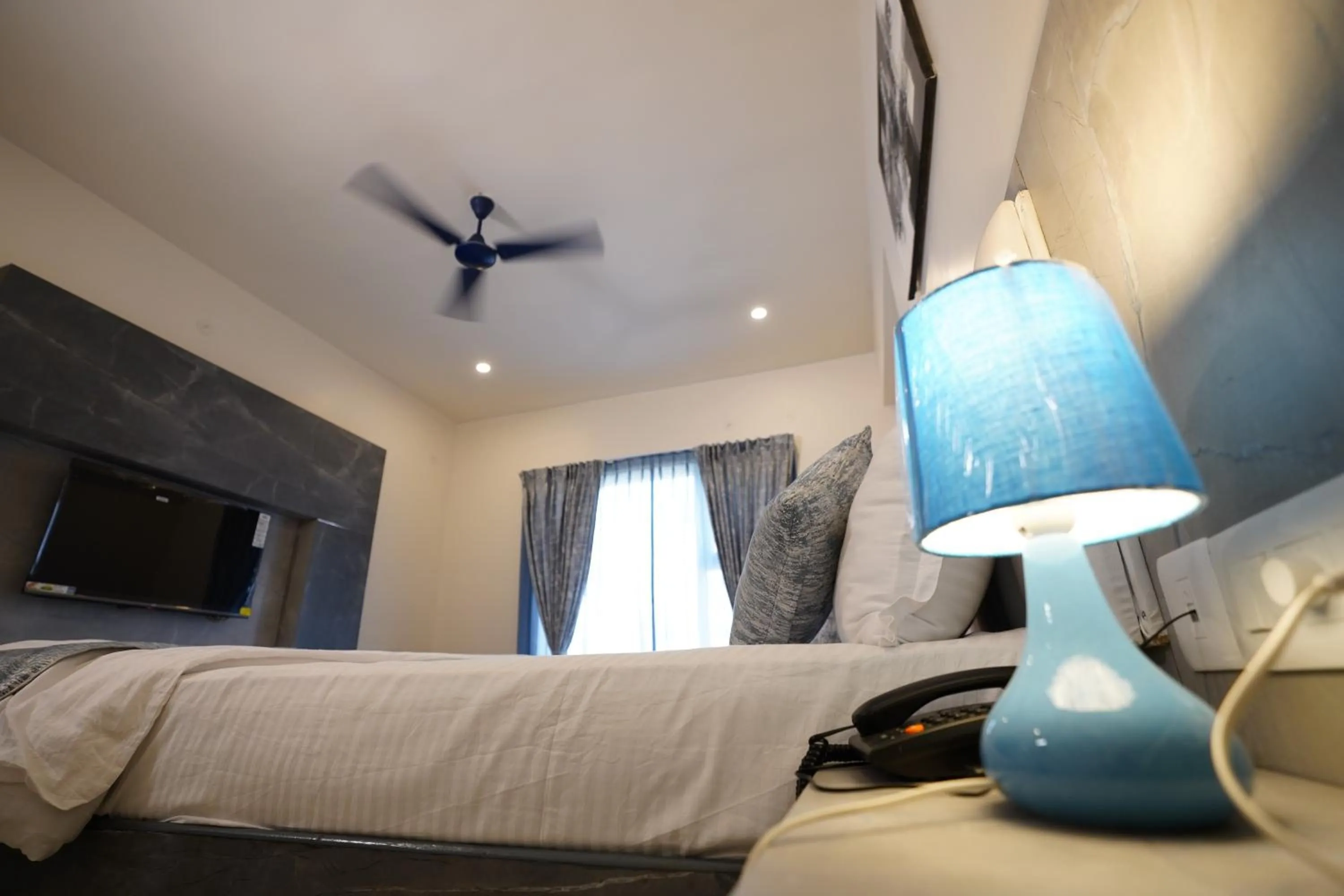 Communal lounge/ TV room, Bed in DrizzleDrop Inn Chennai