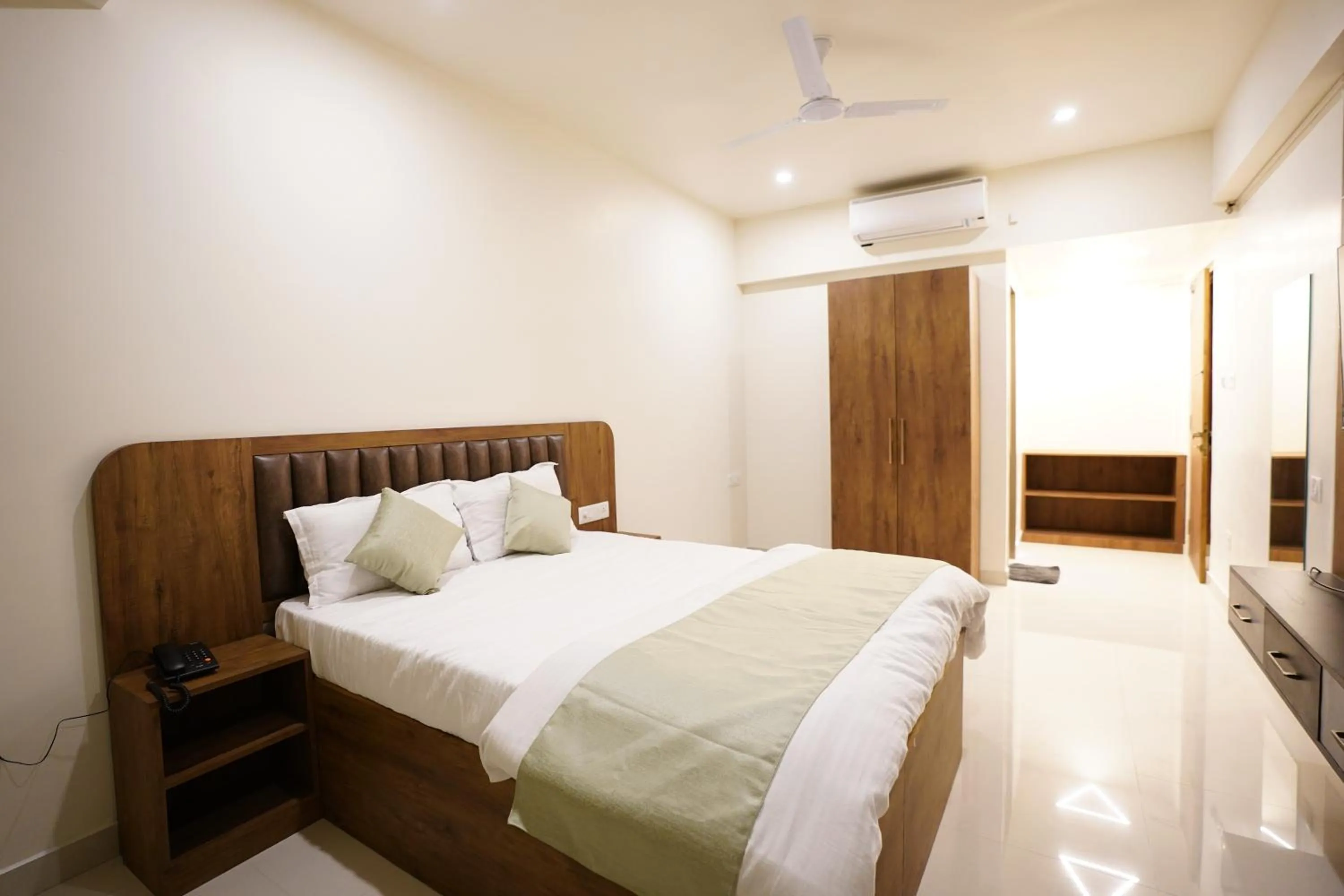 Bed in DrizzleDrop Inn Chennai
