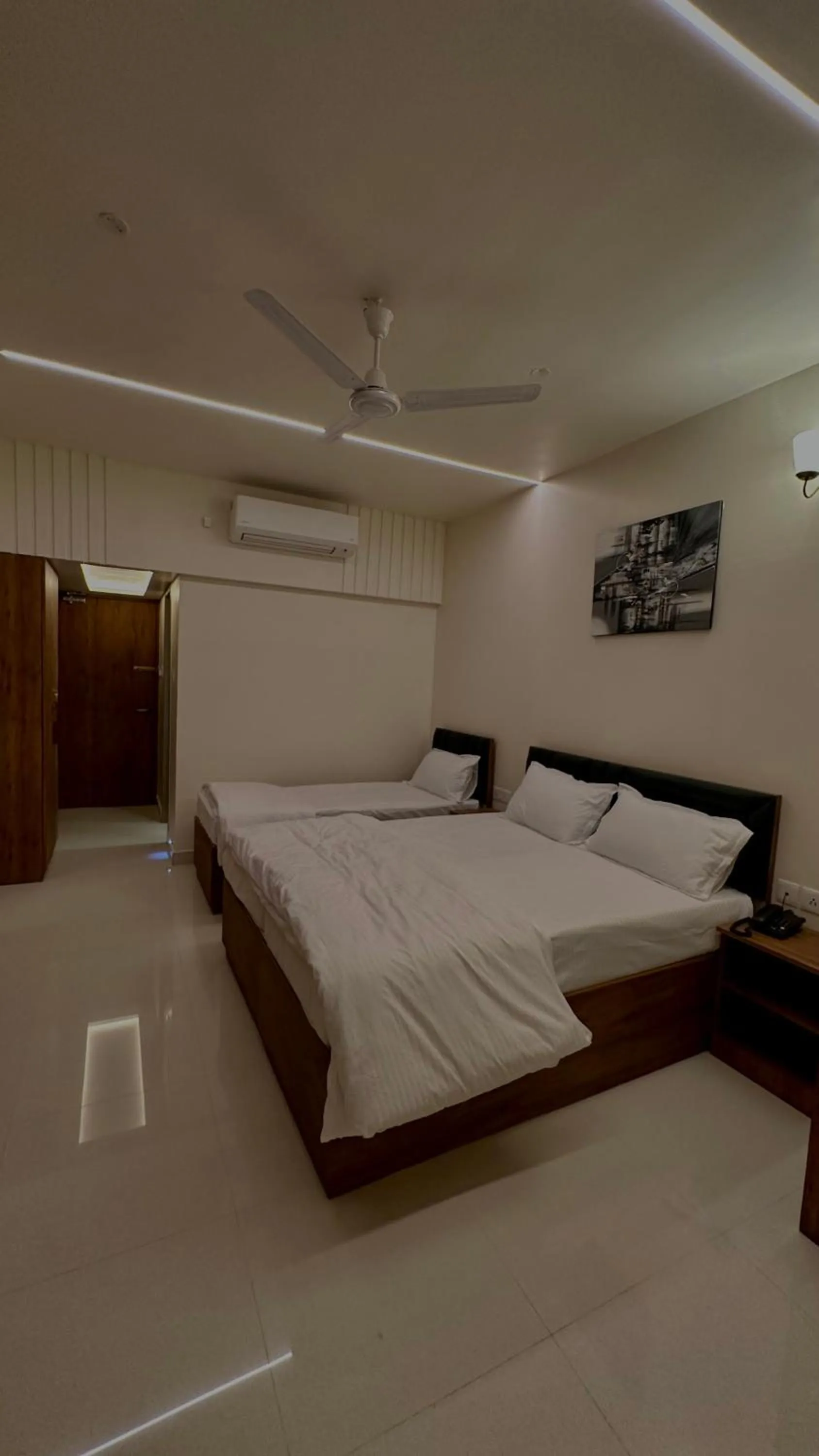 Bed in DrizzleDrop Inn Chennai