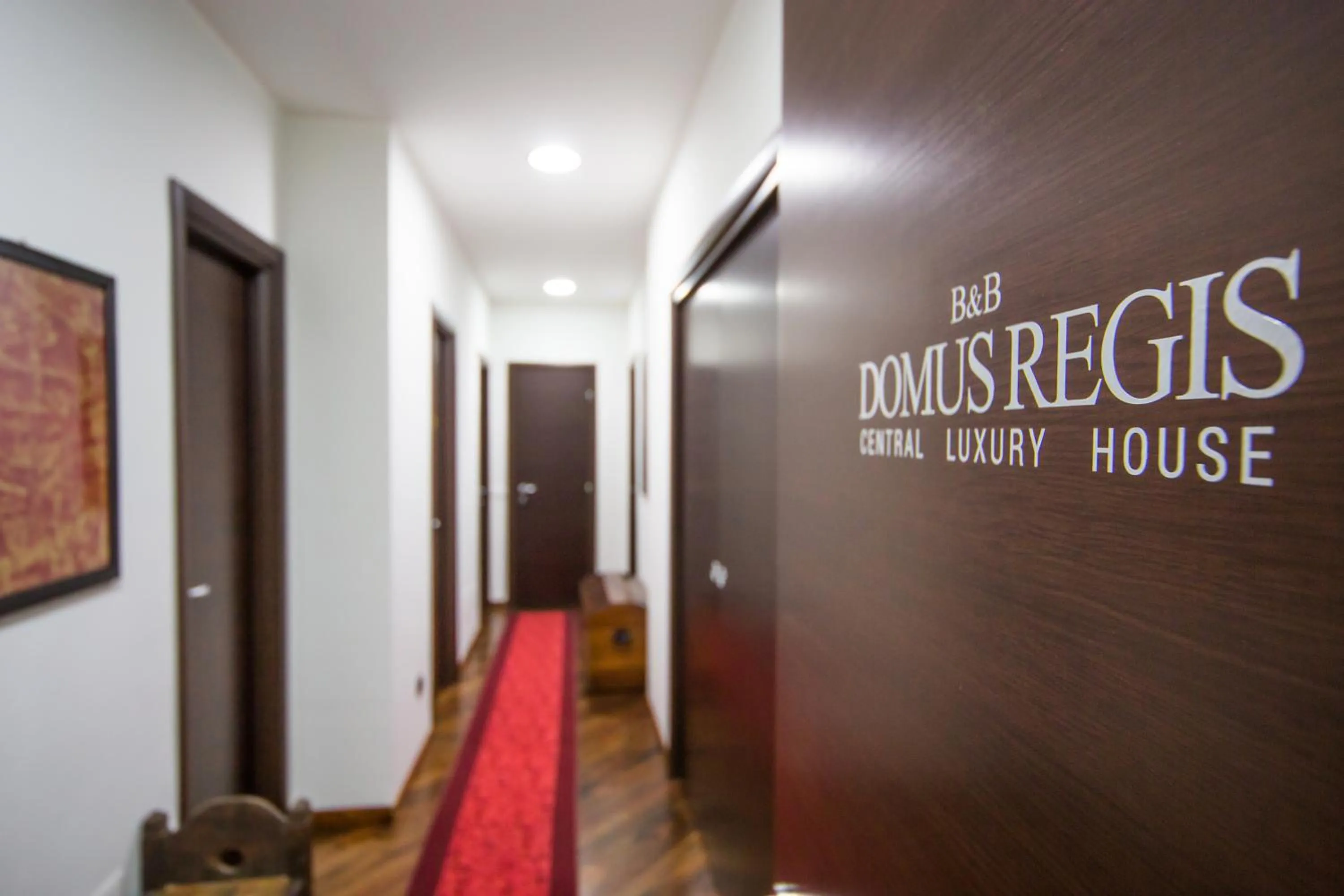 Property logo or sign in Domus Regis