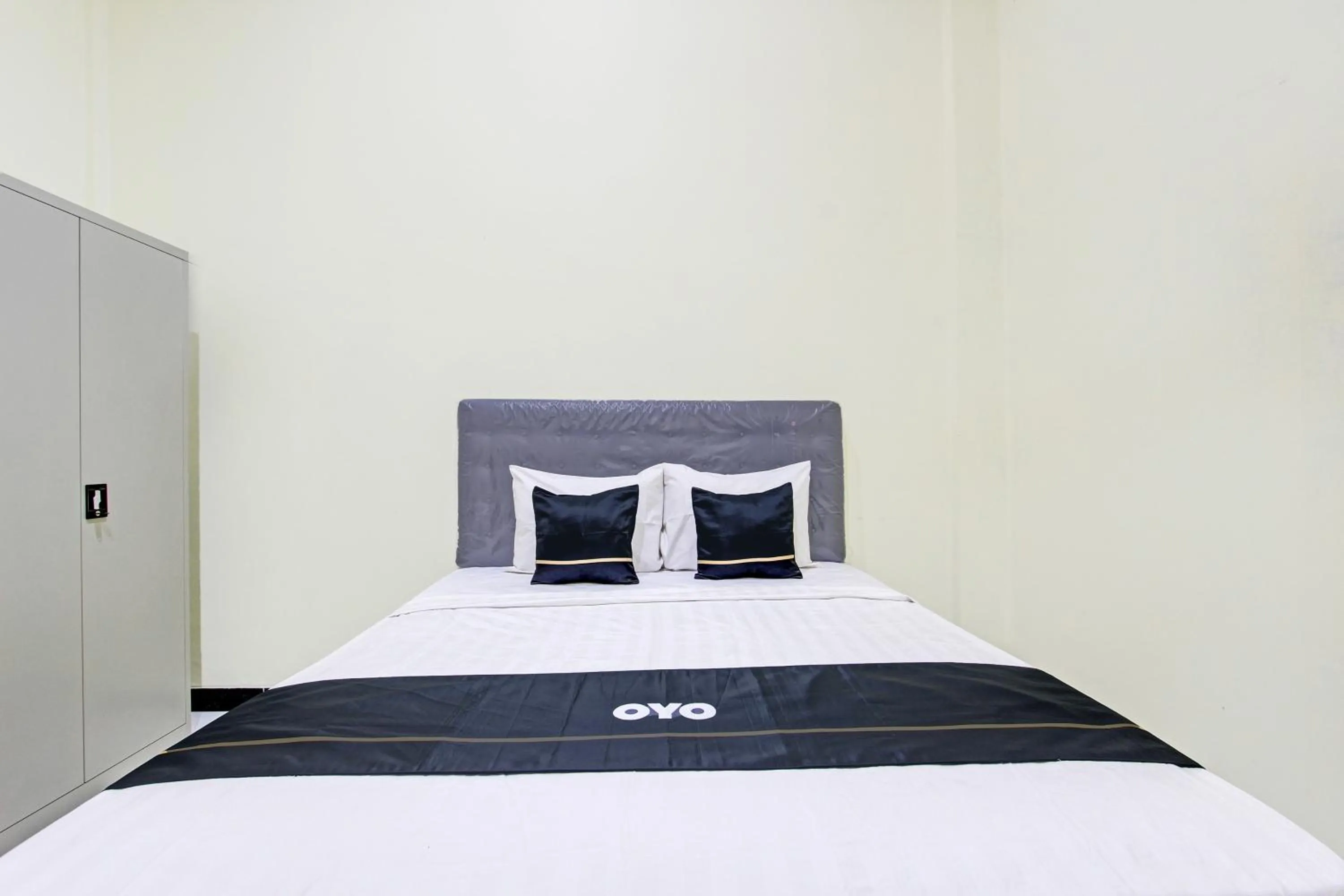 Bedroom in Super OYO Capital O 93204 Hotel Mulia Dua Syariah