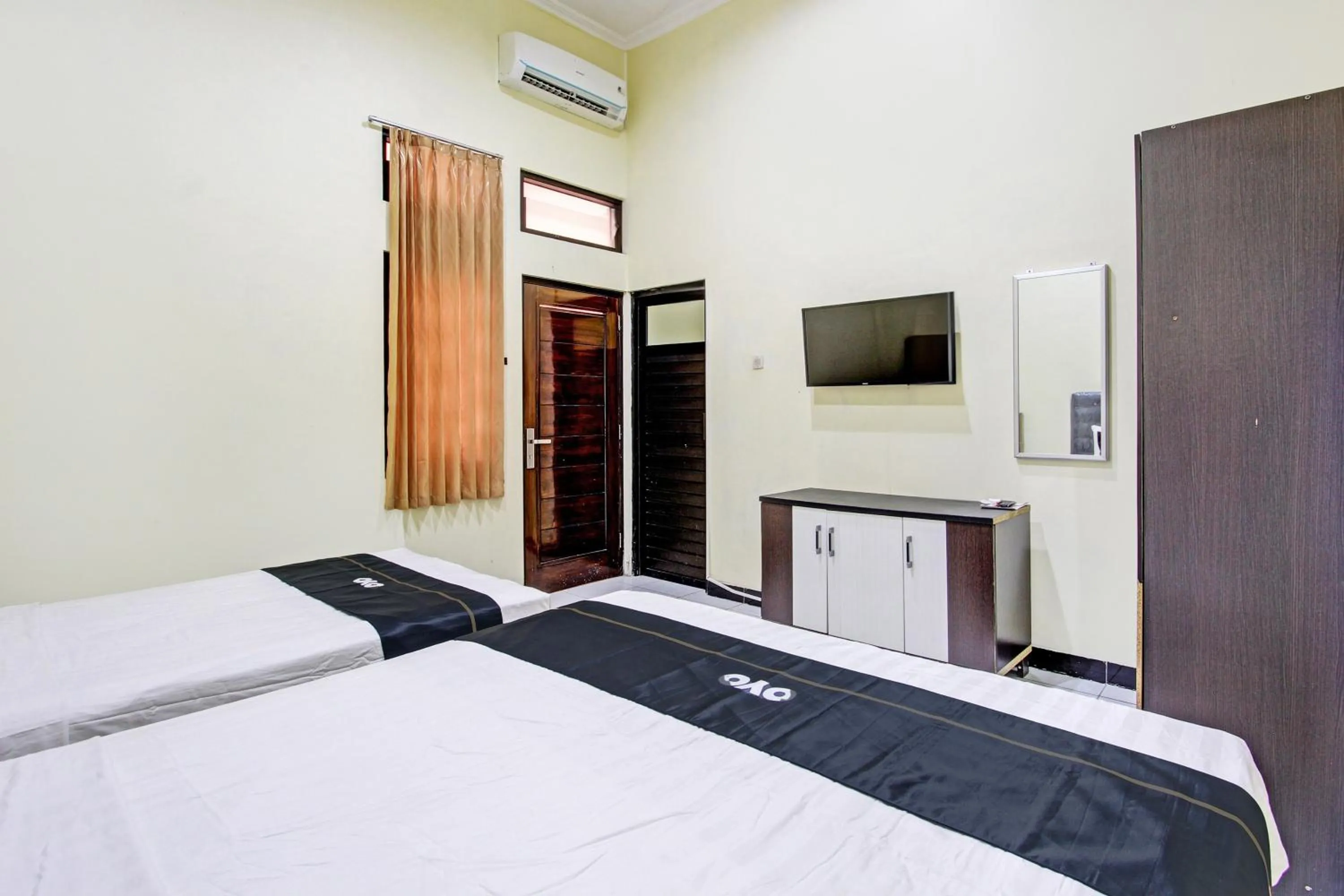 Bedroom in Super OYO Capital O 93204 Hotel Mulia Dua Syariah