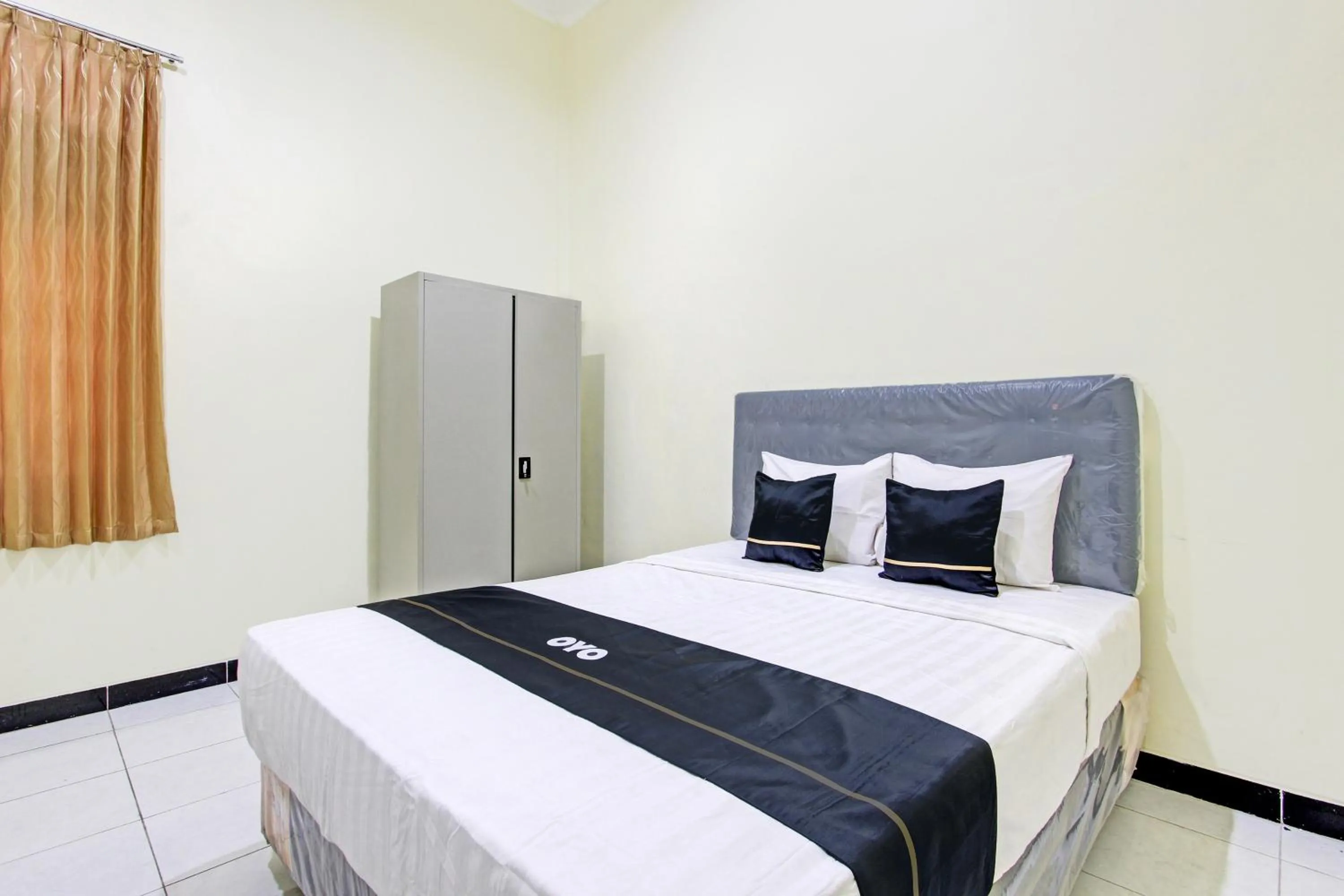 Bedroom in Super OYO Capital O 93204 Hotel Mulia Dua Syariah