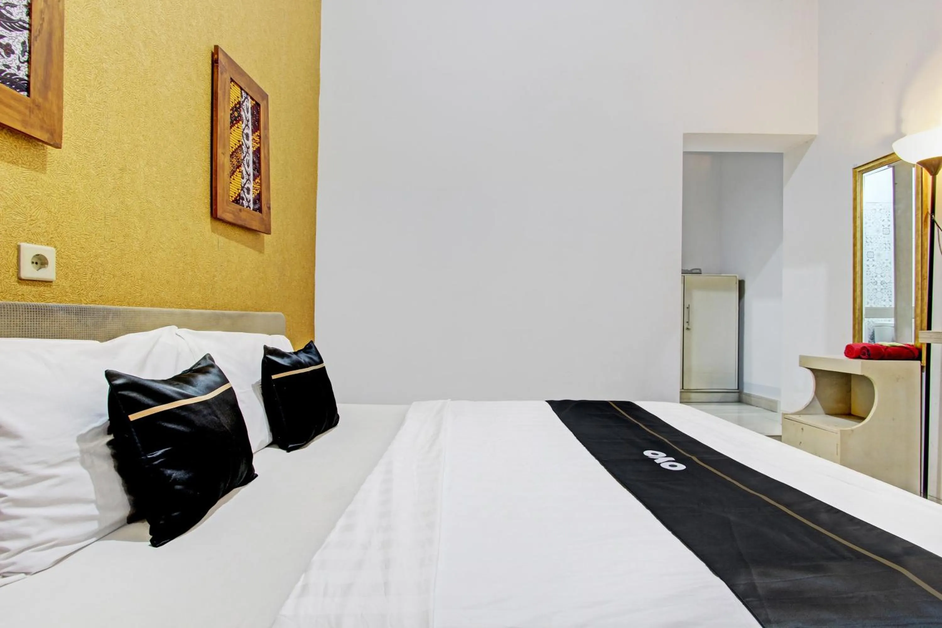 Bedroom in Super OYO Capital O 93240 Candra Dewi Hotel