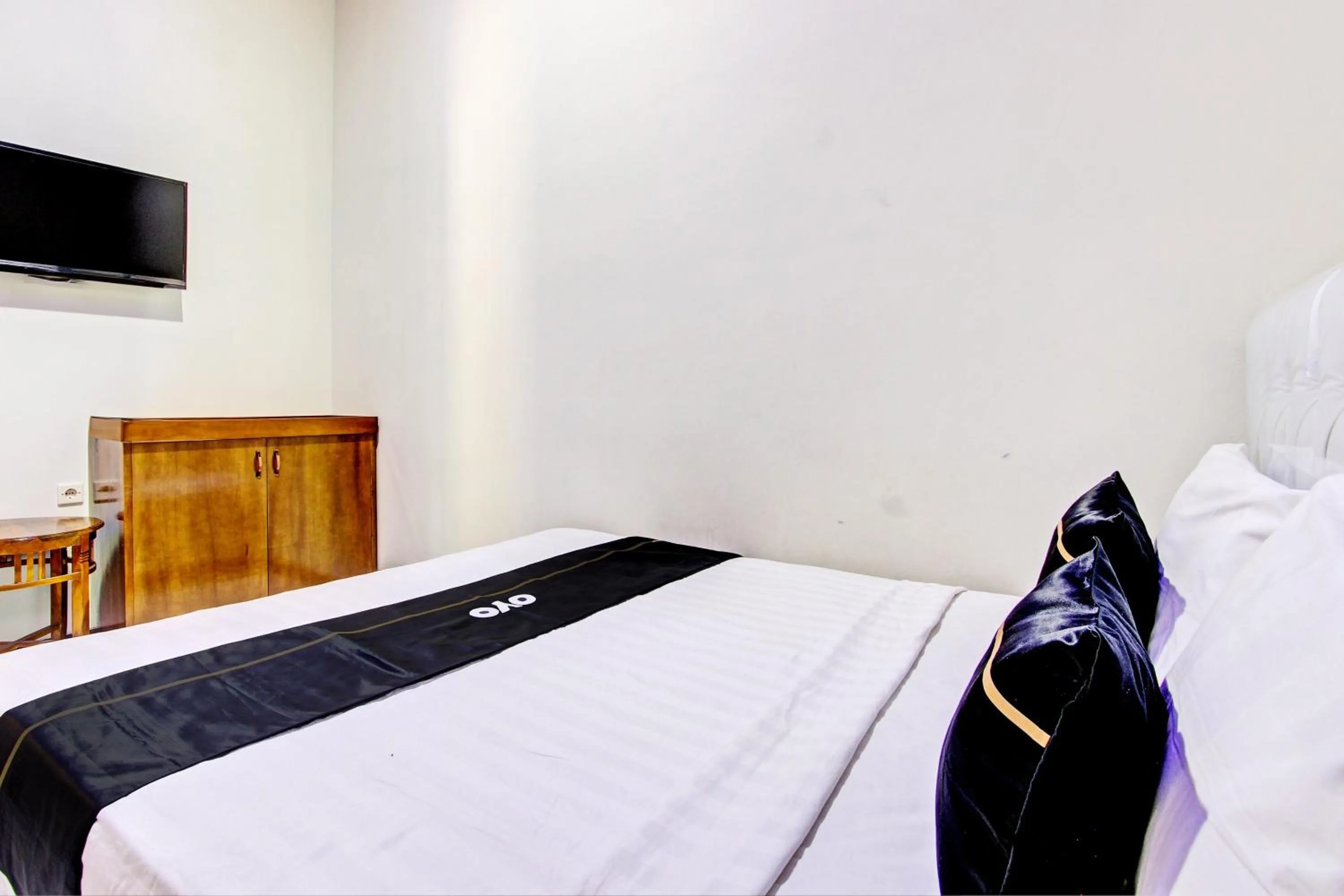 Bedroom in Capital O 93244 Angkasa Inn