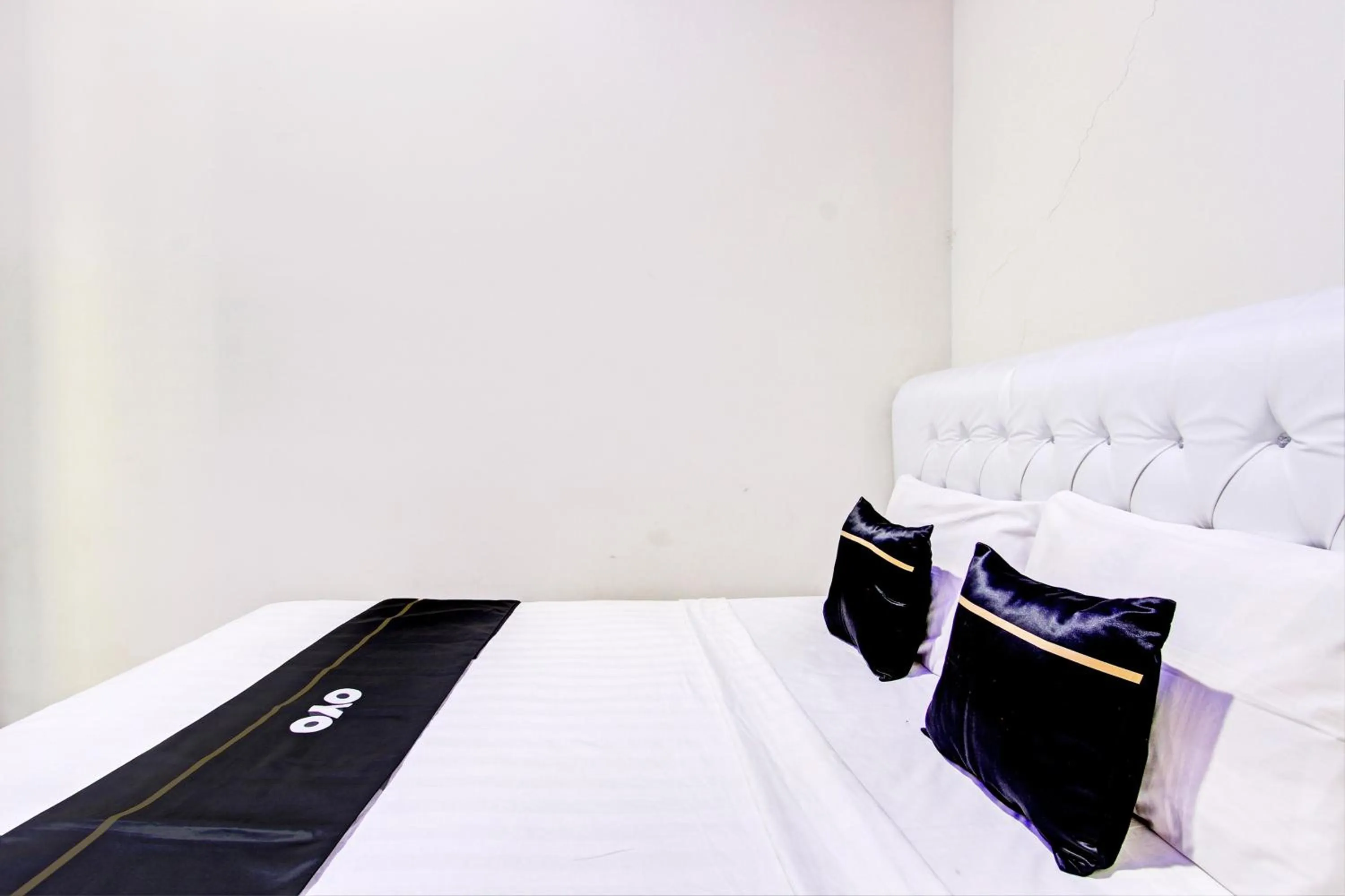 Bedroom in Capital O 93244 Angkasa Inn