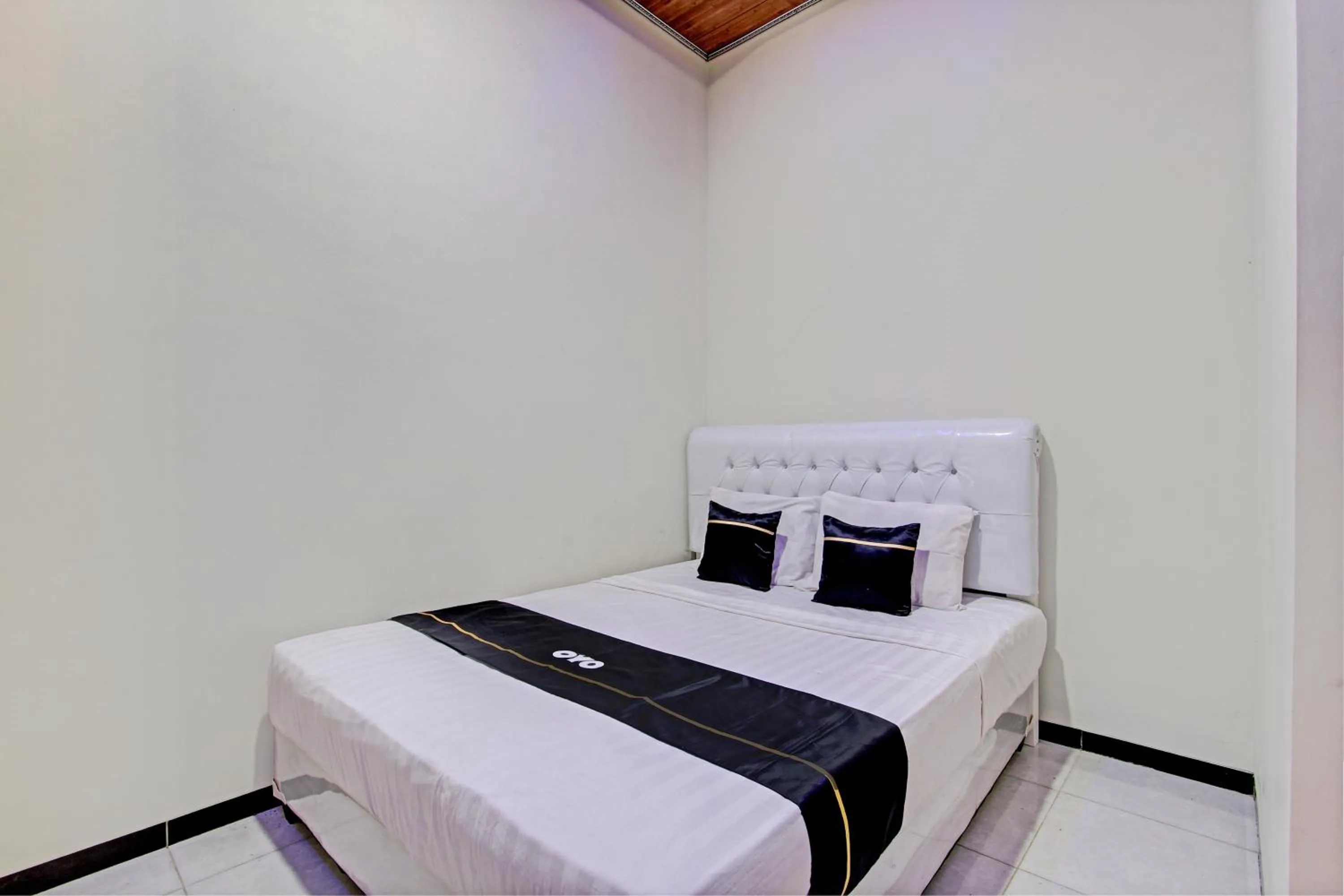 Bedroom in Capital O 93244 Angkasa Inn