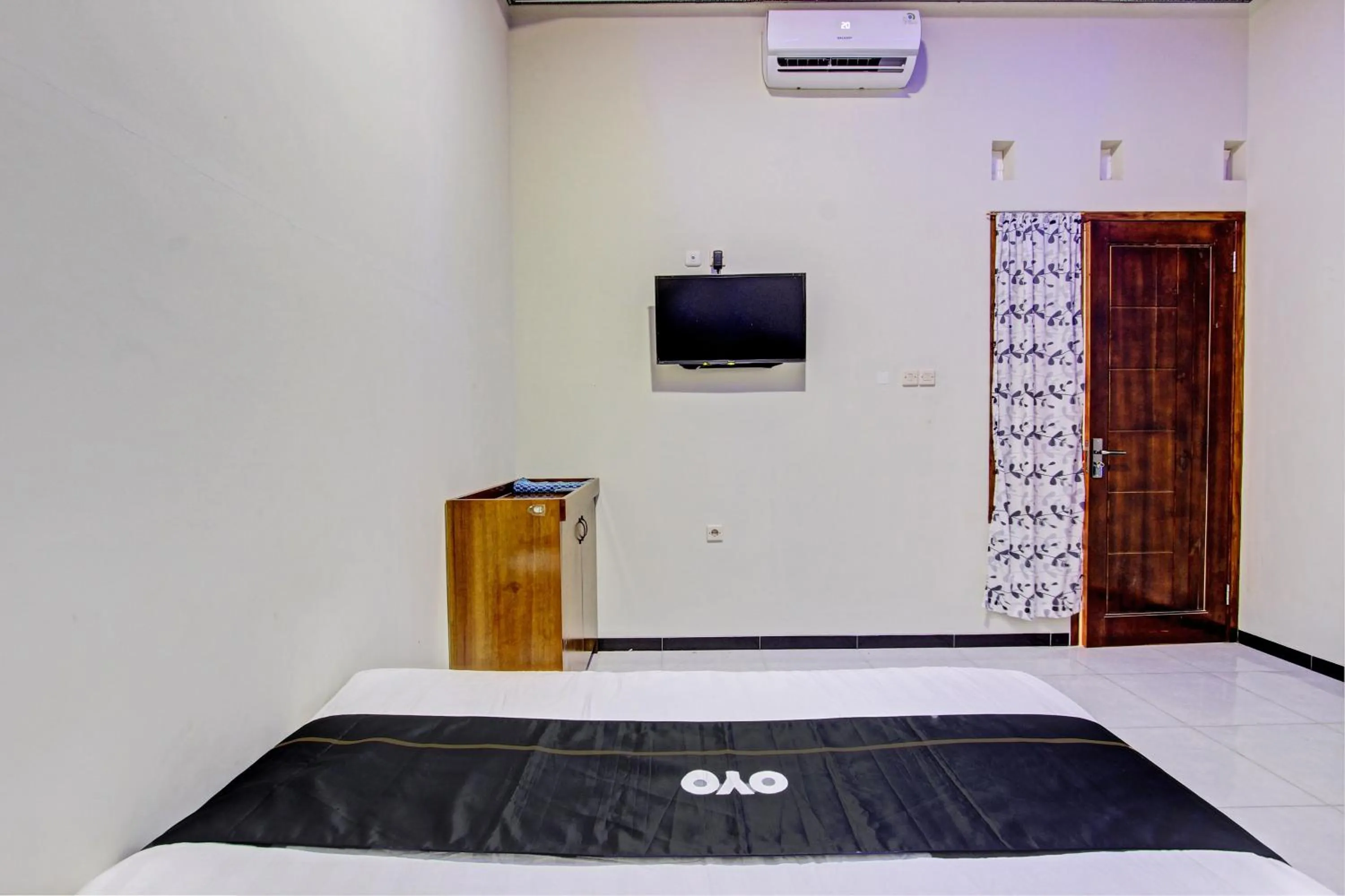 Bedroom in Capital O 93244 Angkasa Inn