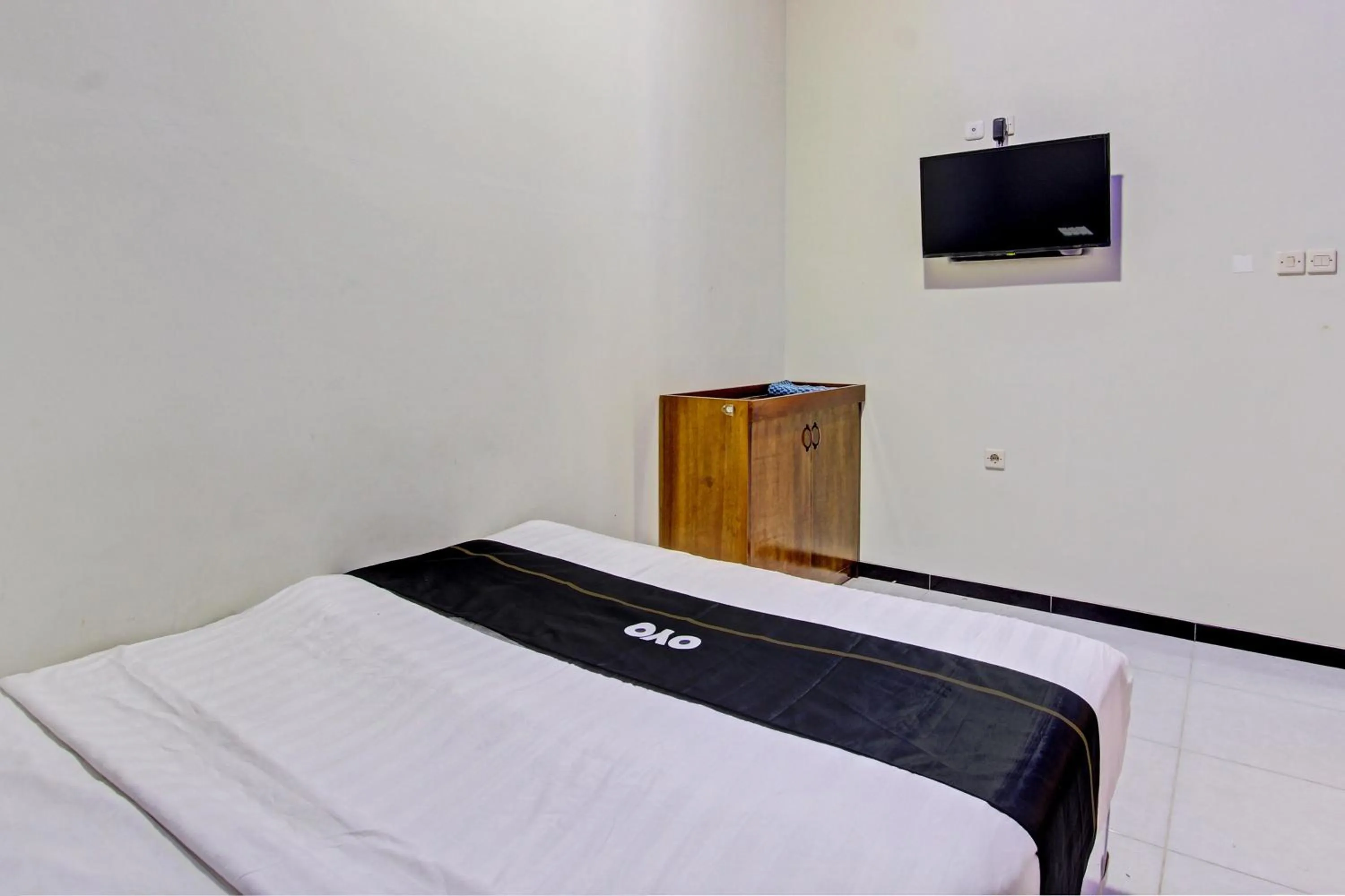 Bedroom in Capital O 93244 Angkasa Inn