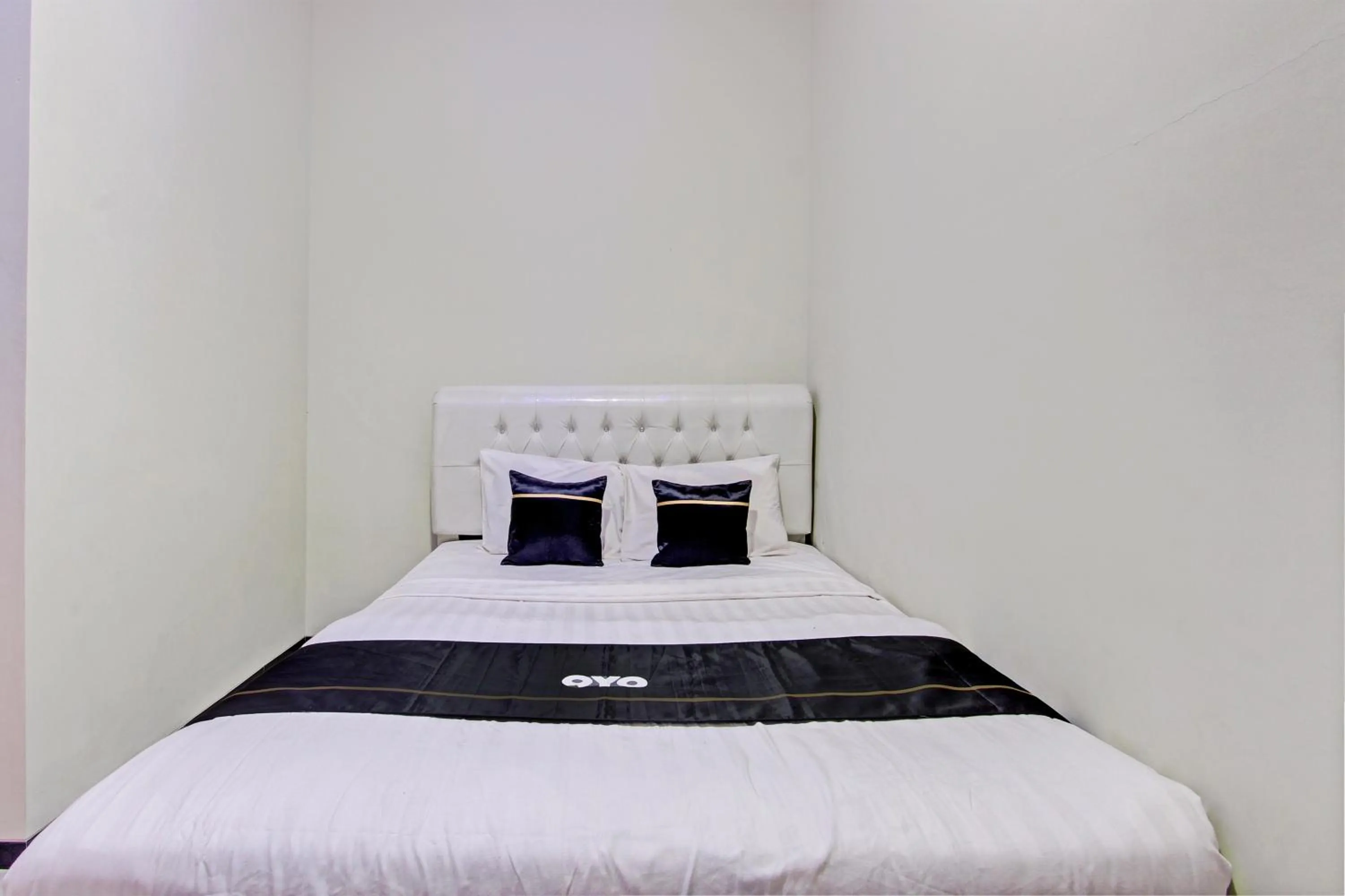 Bedroom in Capital O 93244 Angkasa Inn