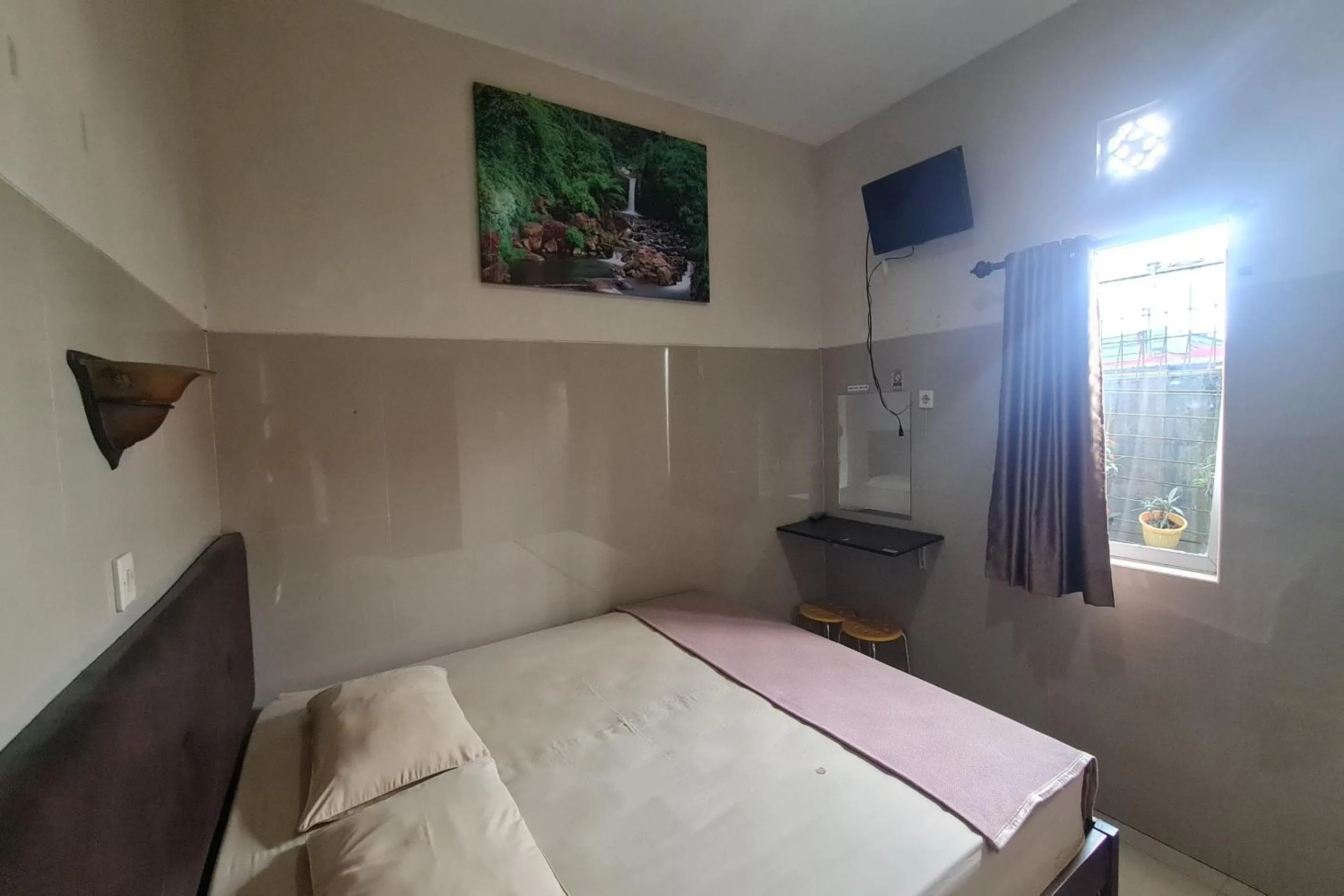 Bedroom, Bed in Capital O 93250 Hotel Tirta Kencana 2 Baturaden