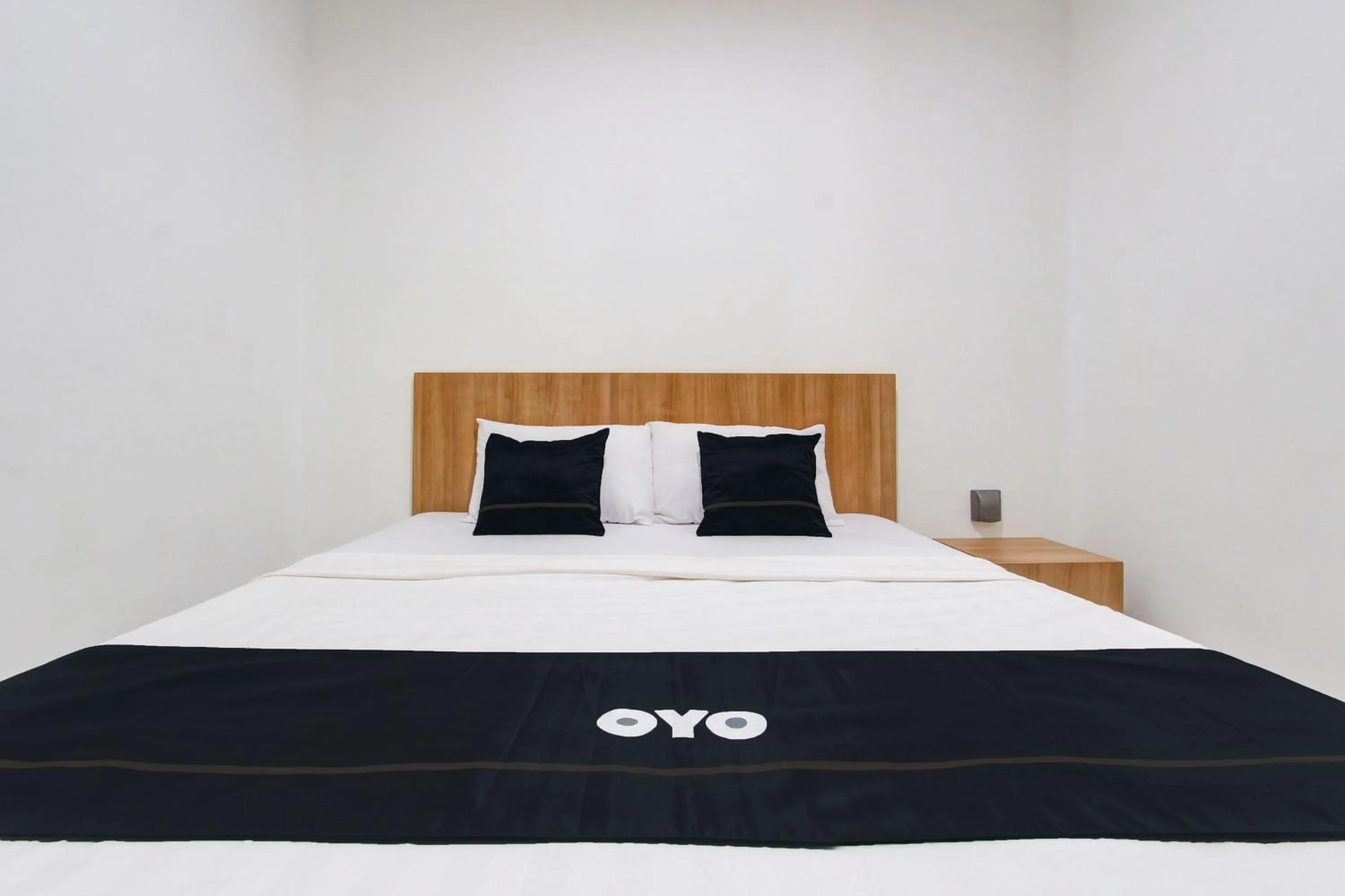 Bedroom in Capital O 93266 Palmier Hotel