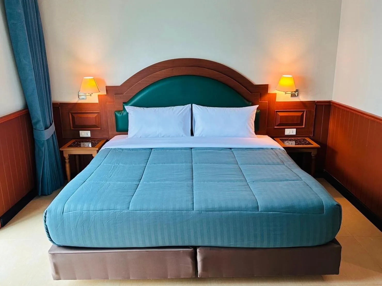 Bed in Sawasdee Apartment Patong