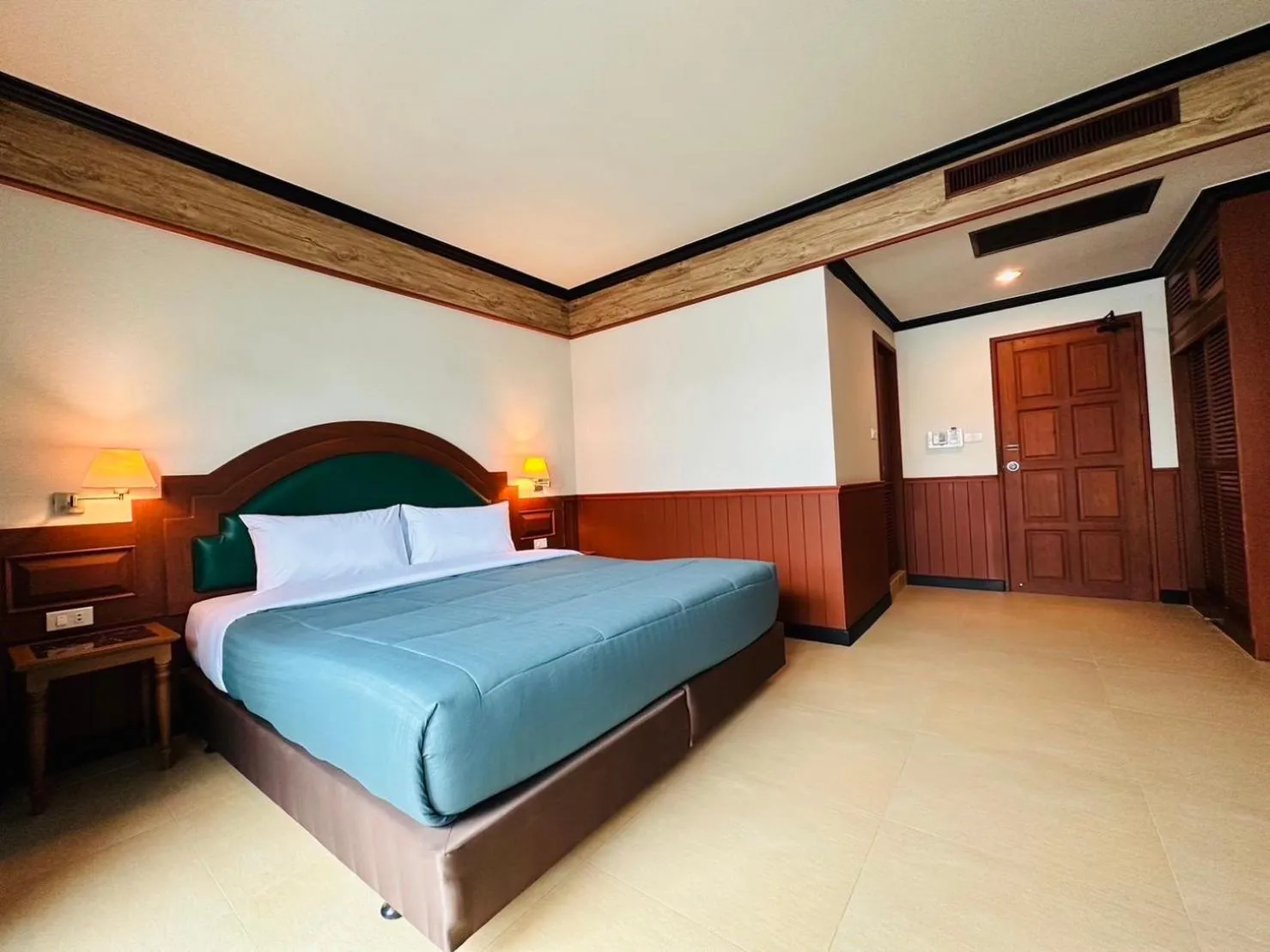 Bed in Sawasdee Apartment Patong