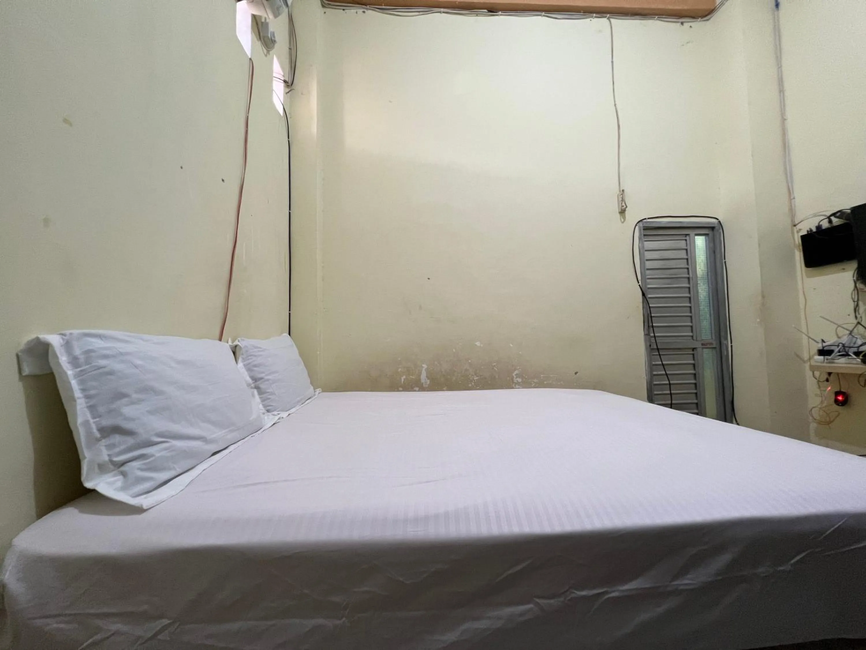 Bedroom, Bed in Hotel O Mely Homestay