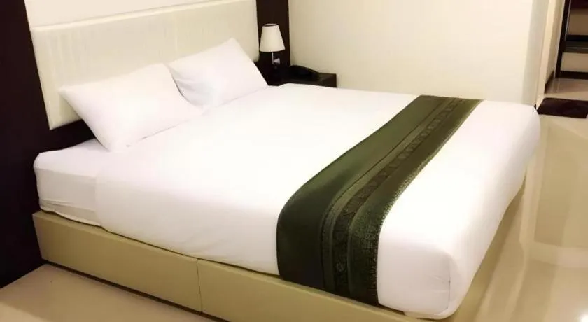 Bed in The Capital Hotel