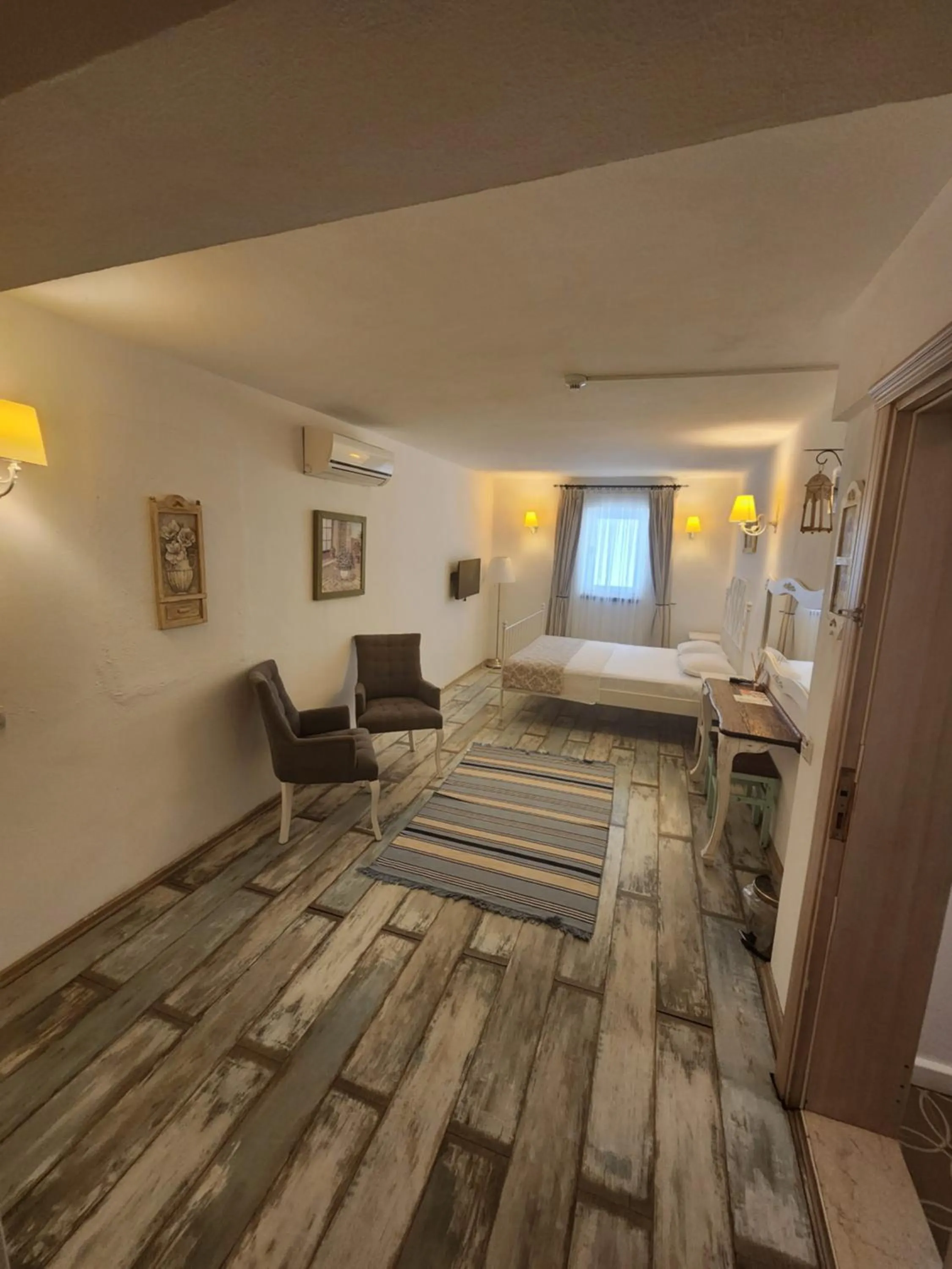 Bed in Tarcin Alacati Hotel