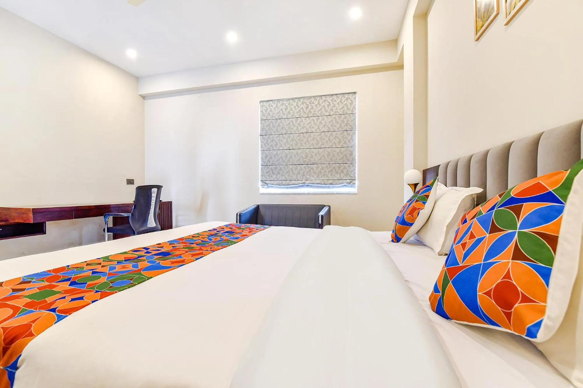 Bed in FabHotel Pravaasam Residency