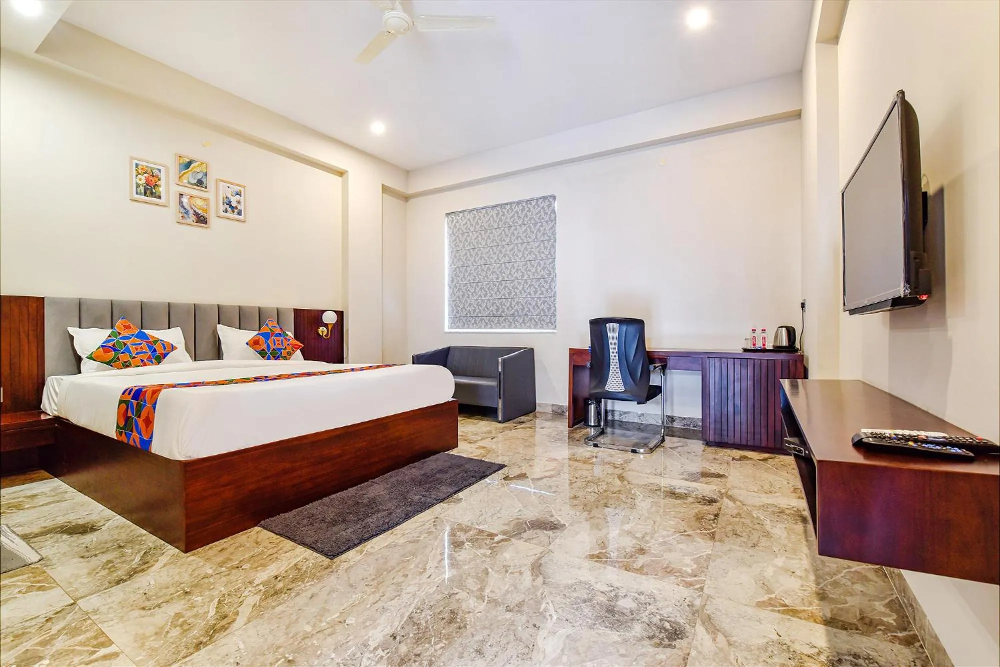 Bed in FabHotel Pravaasam Residency