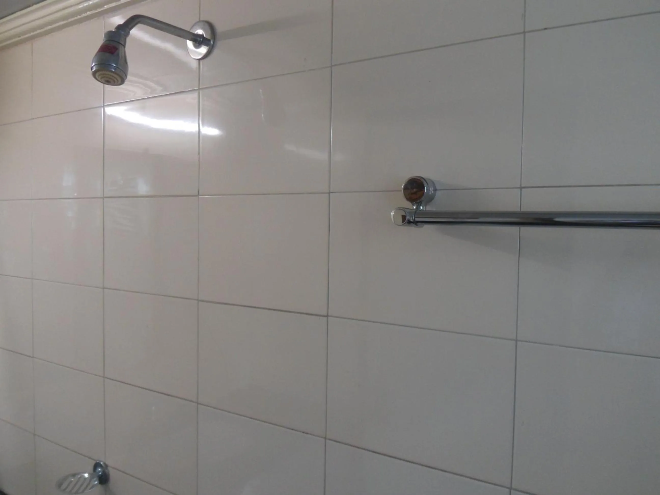 Bathroom in Hotel Pooja International