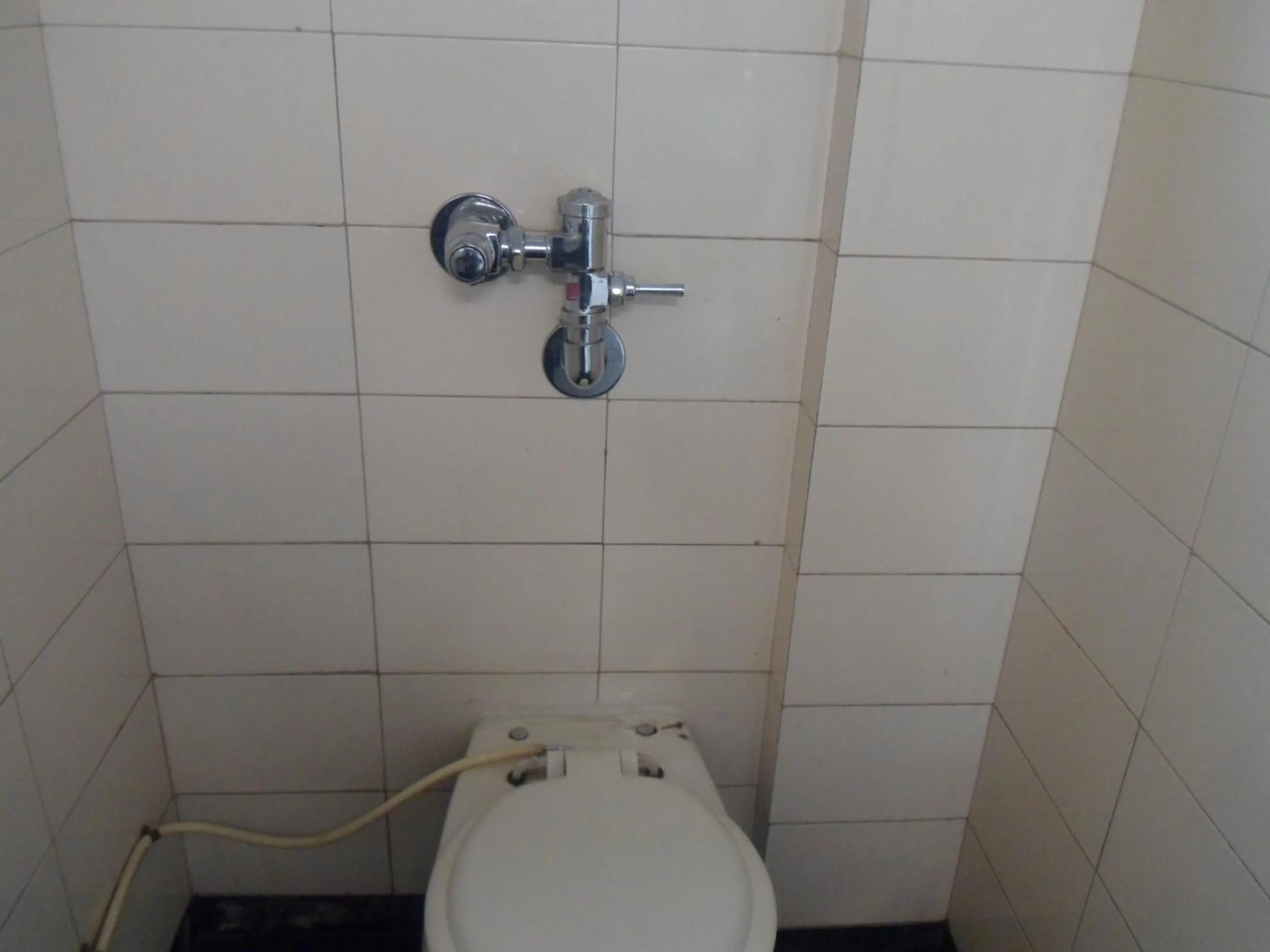 Bathroom in Hotel Pooja International