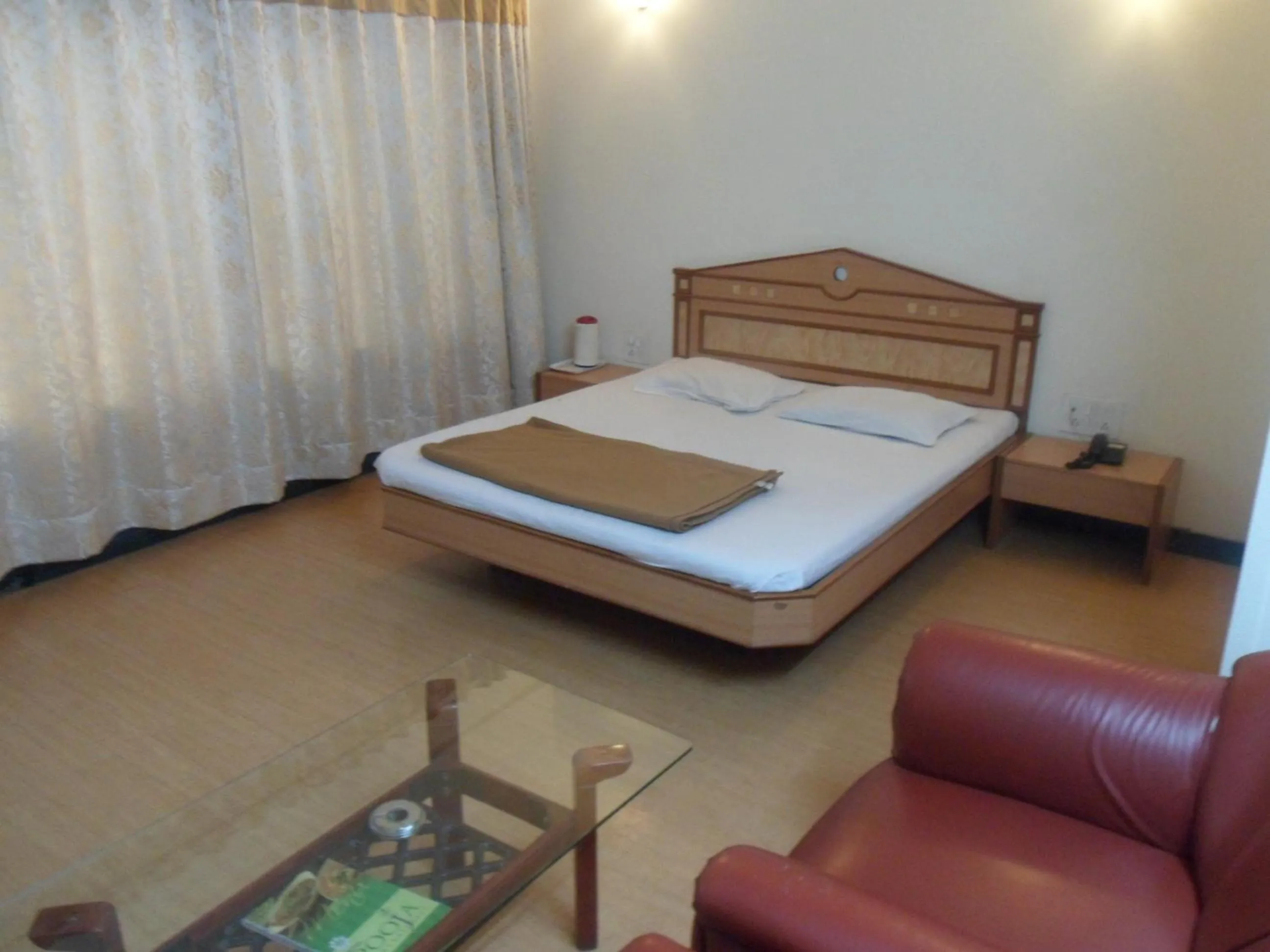 Bed in Hotel Pooja International