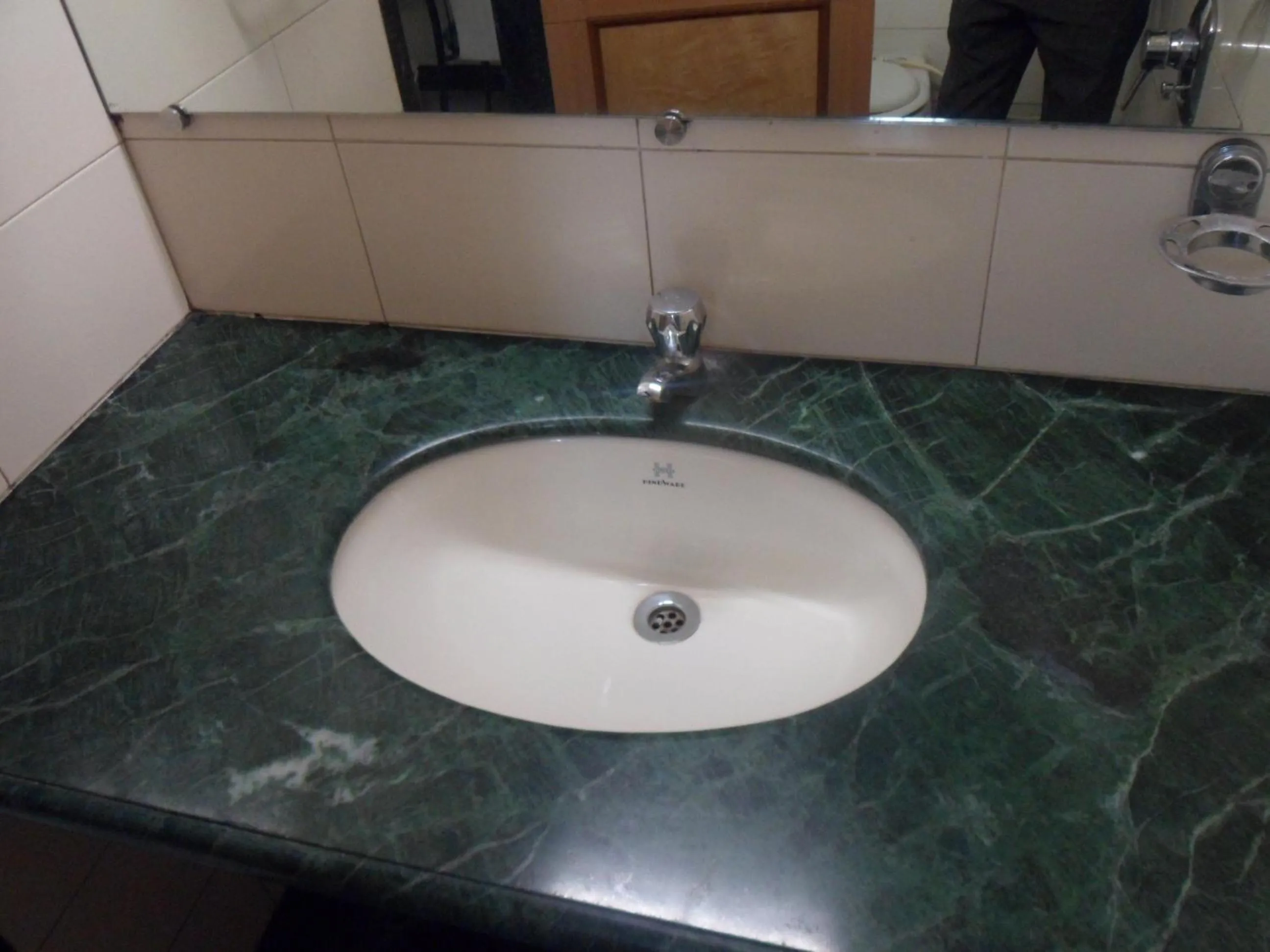 Bathroom in Hotel Pooja International