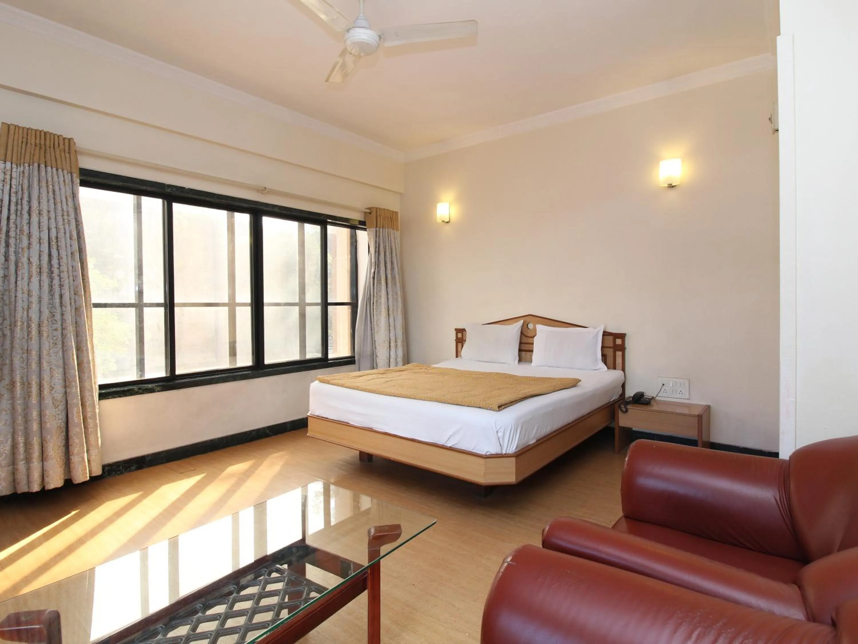 Bed in Hotel Pooja International