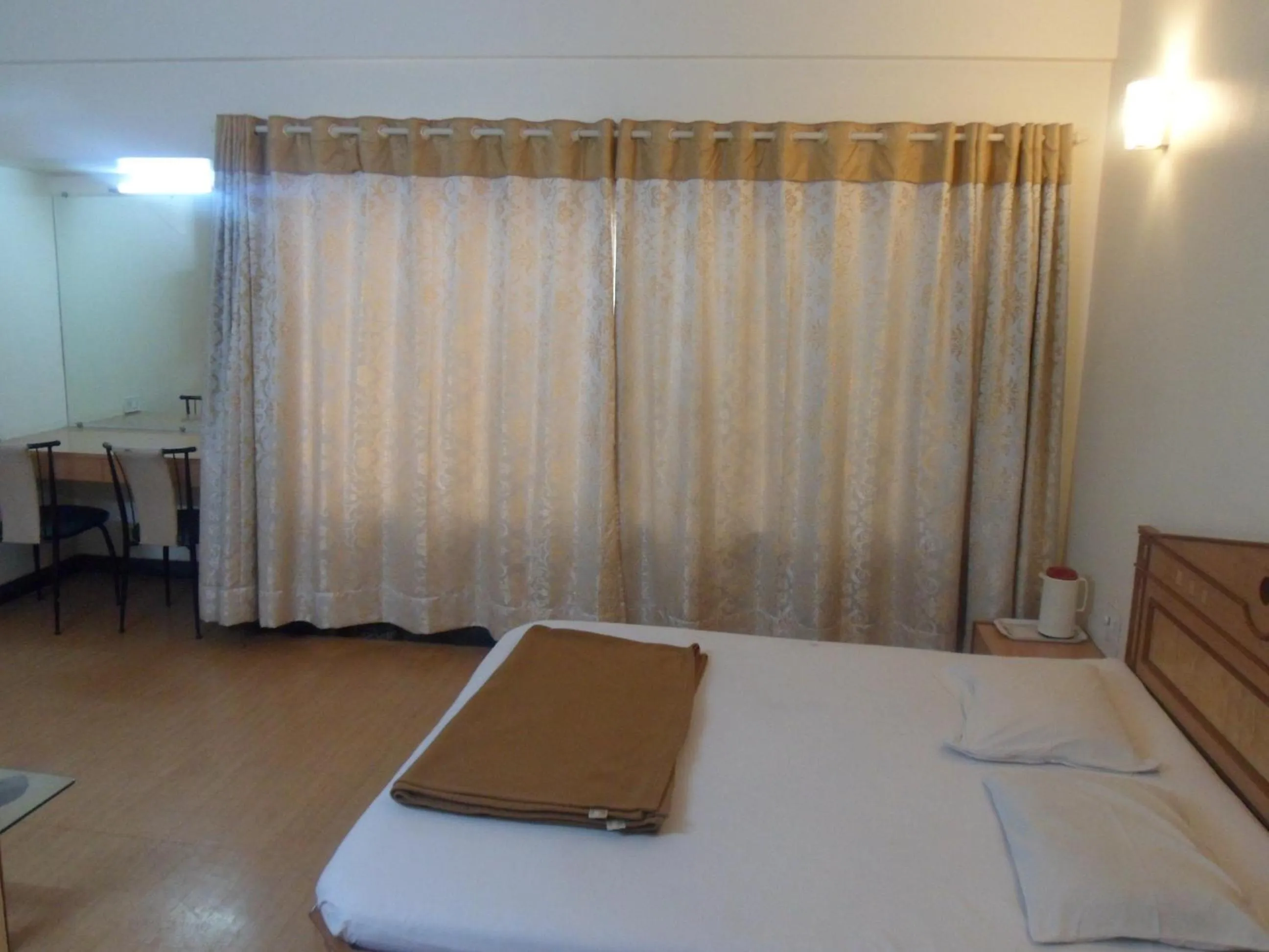 Bed in Hotel Pooja International