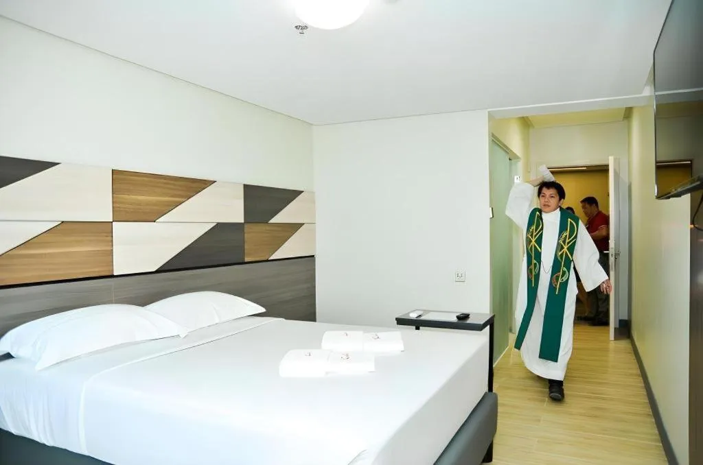 Bed in Travelite Hotel Legarda