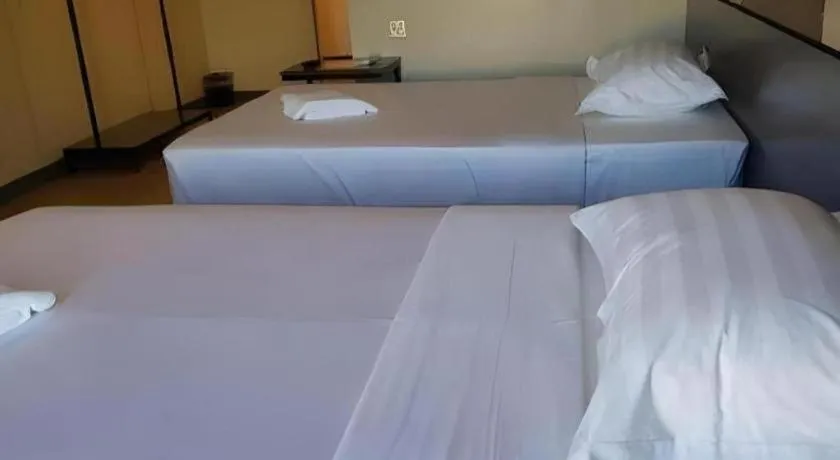 Bed in Travelite Hotel Legarda