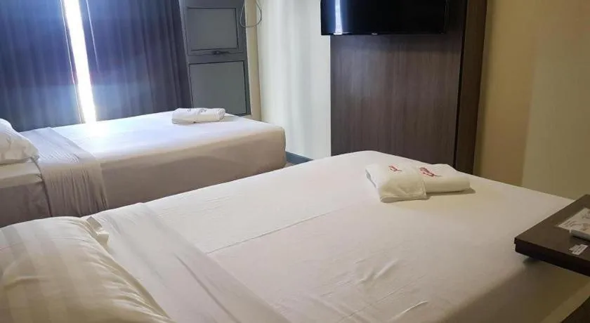 Bed in Travelite Hotel Legarda